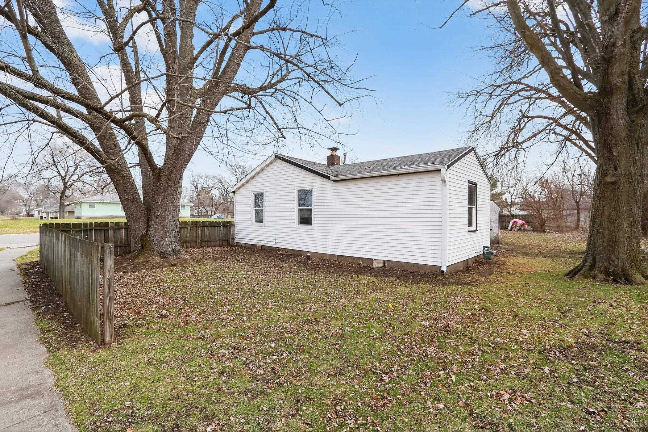 2120 Belden Street Rockford, IL 61101 - Photo 21 of 22 a view of a house with a yard
