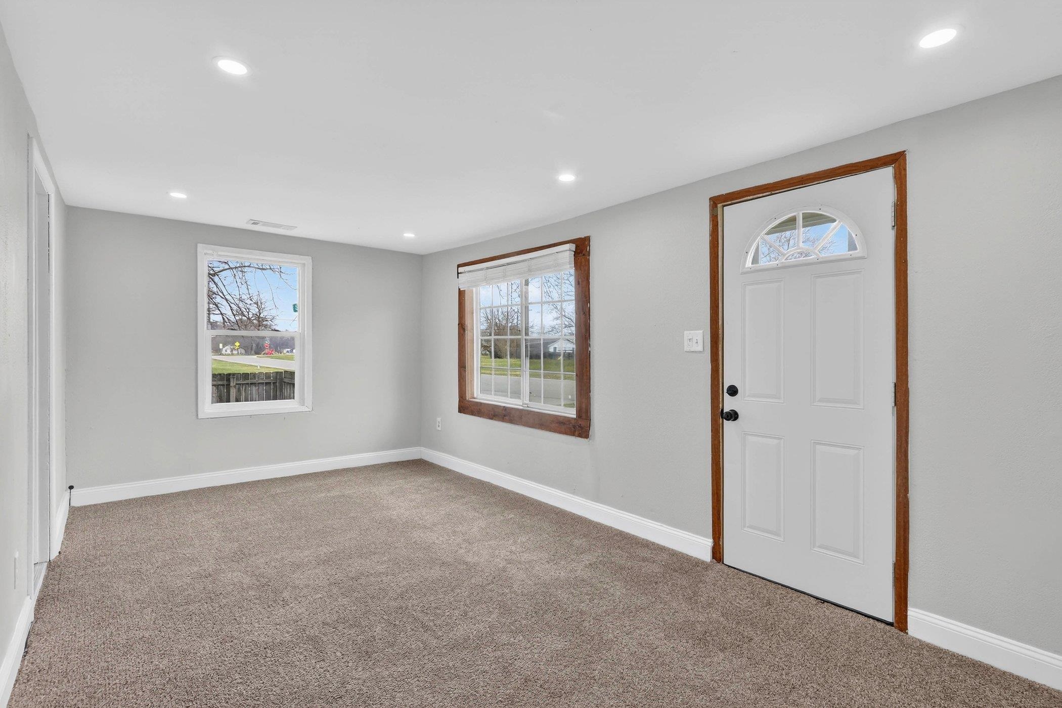 2120 Belden Street Rockford, IL 61101 - Photo 4 of 22 a view of an empty room with windows and closet
