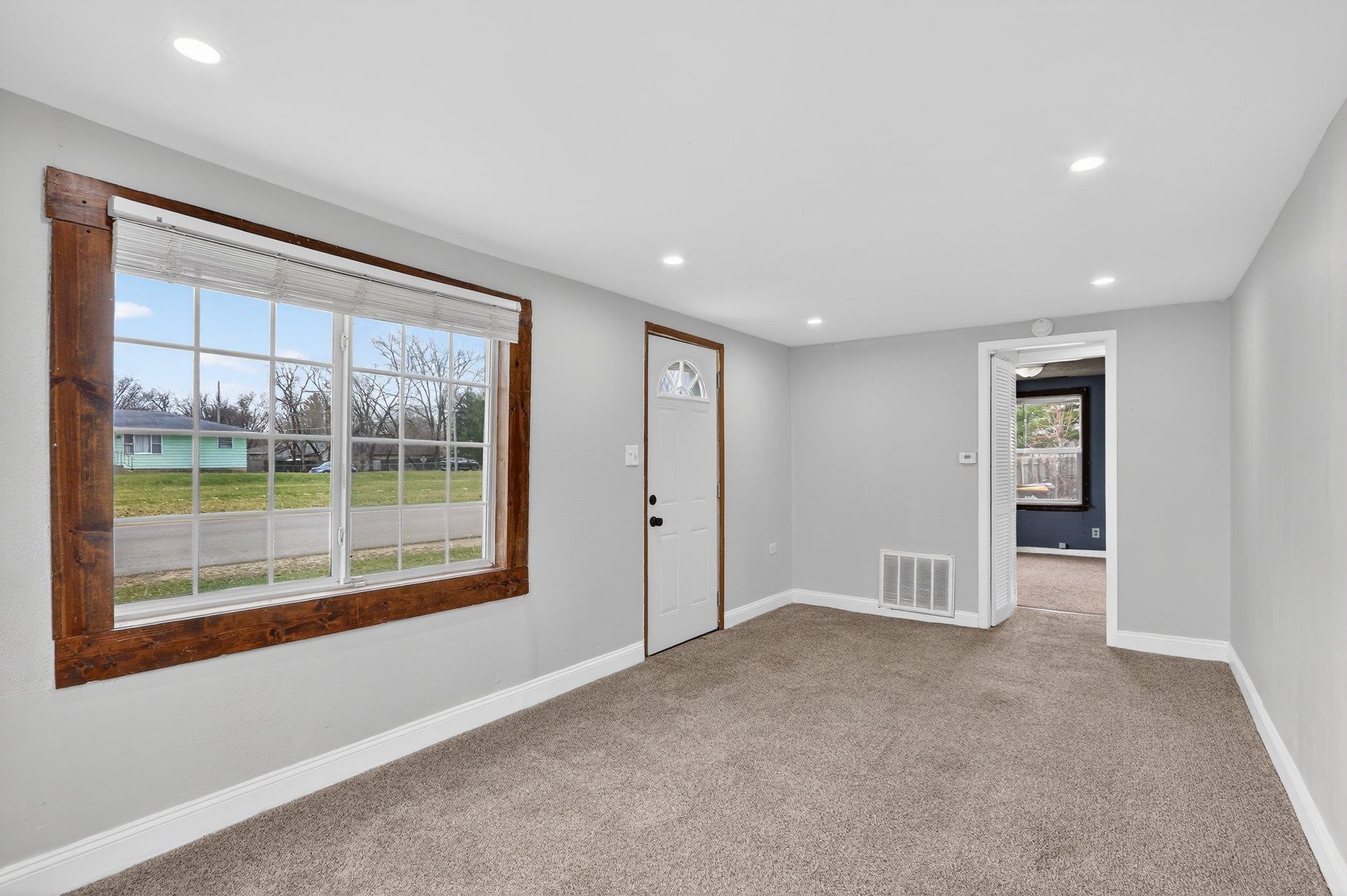 2120 Belden Street Rockford, IL 61101 - Photo 5 of 22 a view of an empty room with a window