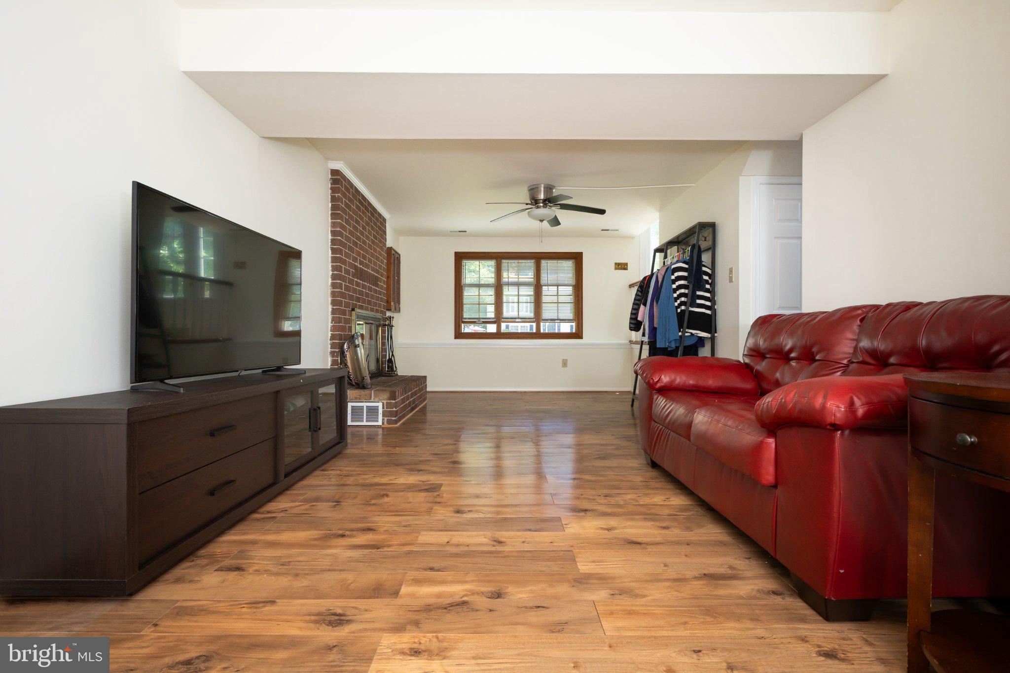 3613 Rusty Rim Ellicott City, MD 21043 - Photo 33 of 39 Spacious living area with warm tones.