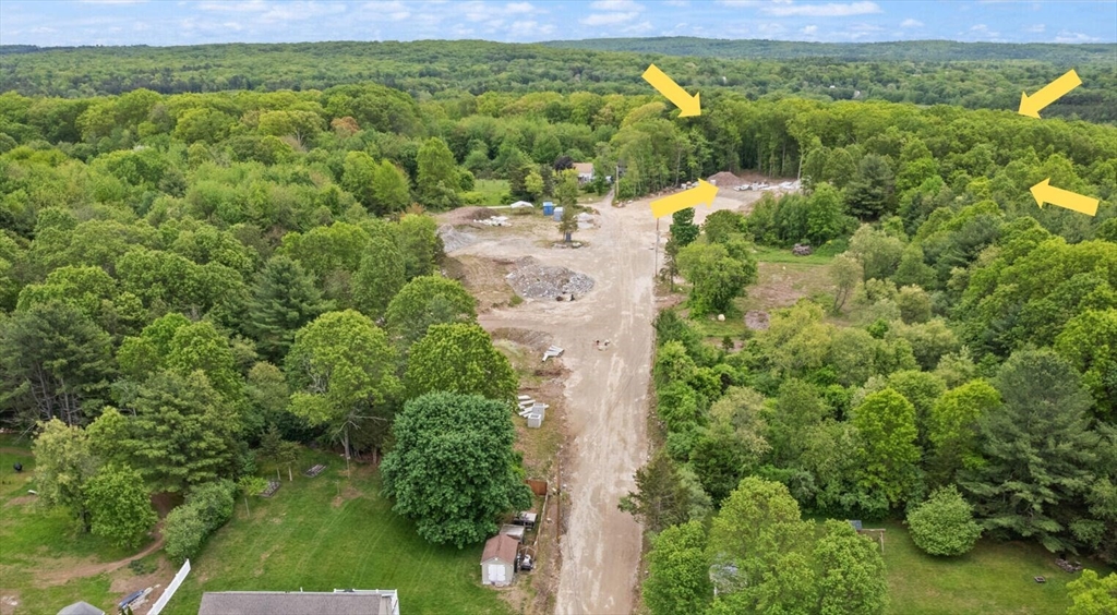 Lot 3 Pickering Road Blackstone, MA 01504 - Photo 2 of 4 an aerial view of residential houses with outdoor space and trees all around