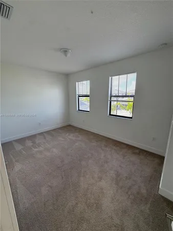 a view of a room with an empty space