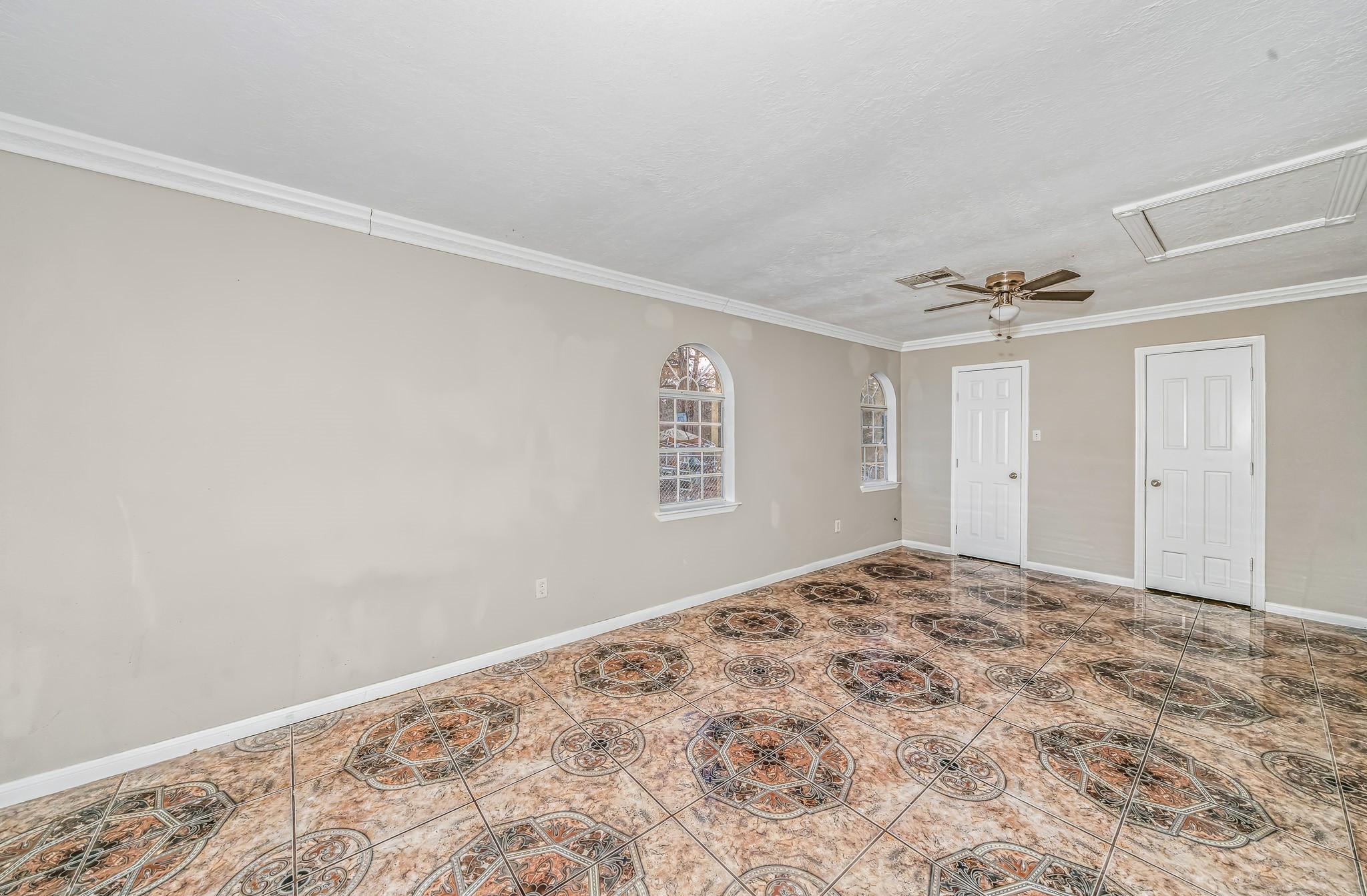 4771 Teas Court Conroe, TX 77304 - Photo 11 of 37 a view of a big room with cabinet and a window
