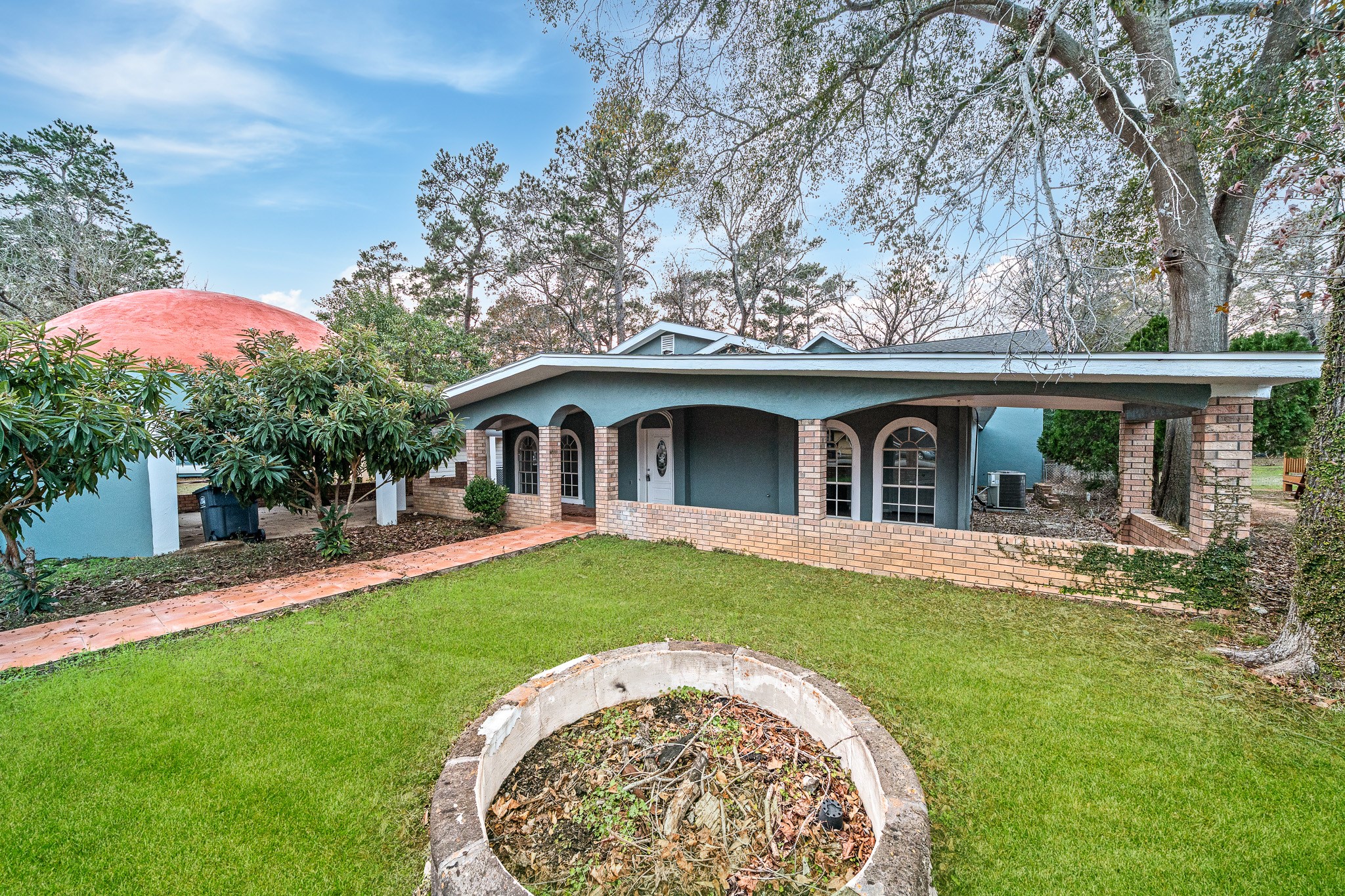 4771 Teas Court Conroe, TX 77304 - Photo 2 of 37 a front view of a house with garden