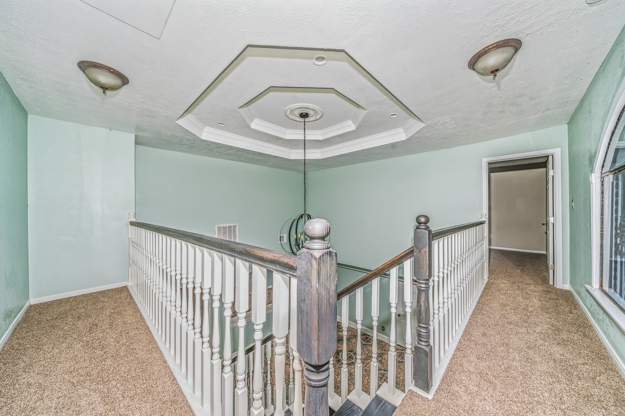 4771 Teas Court Conroe, TX 77304 - Photo 26 of 37 a view of a hallway view with staircase