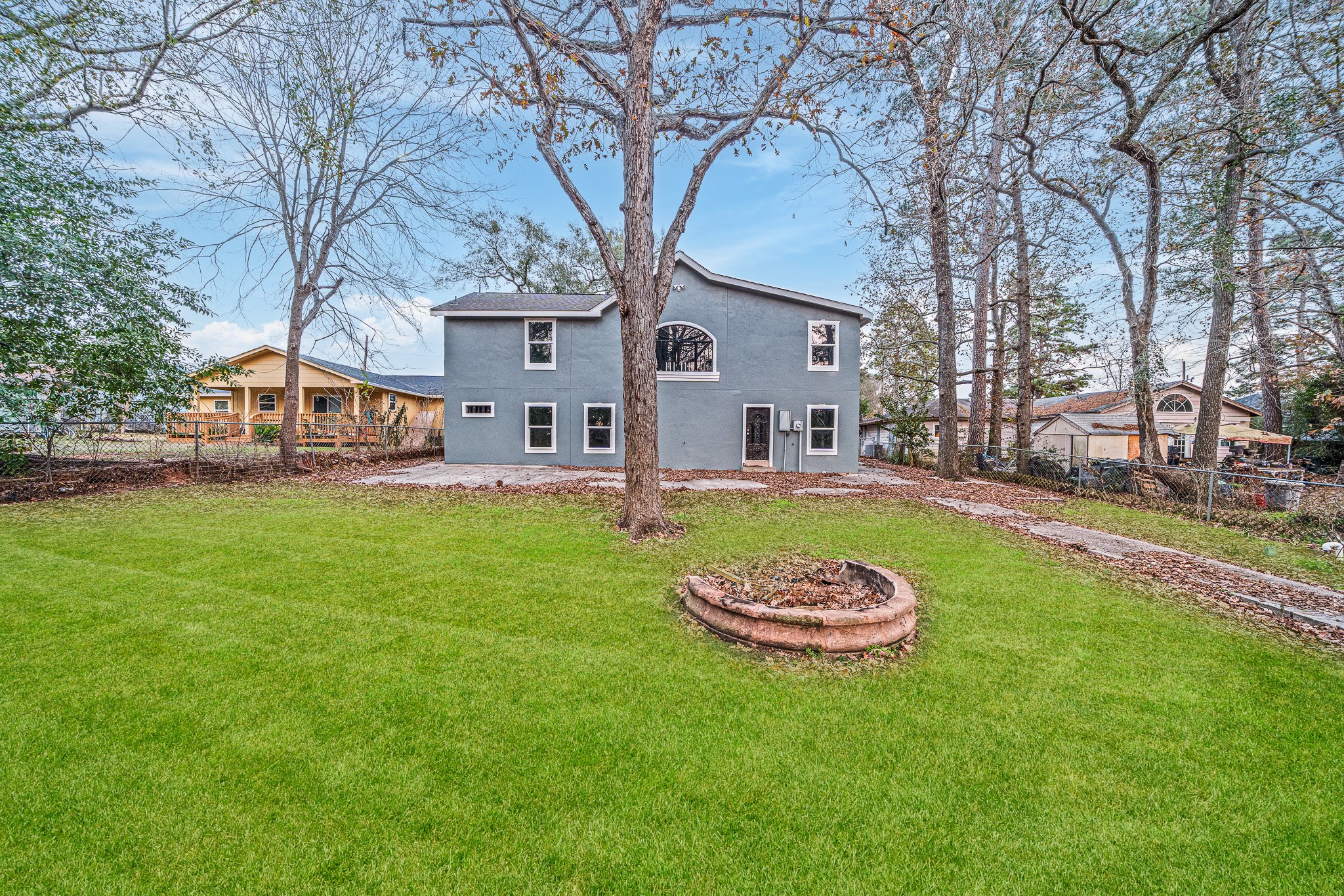4771 Teas Court Conroe, TX 77304 - Photo 5 of 37 a view of a house with a big yard and fountain