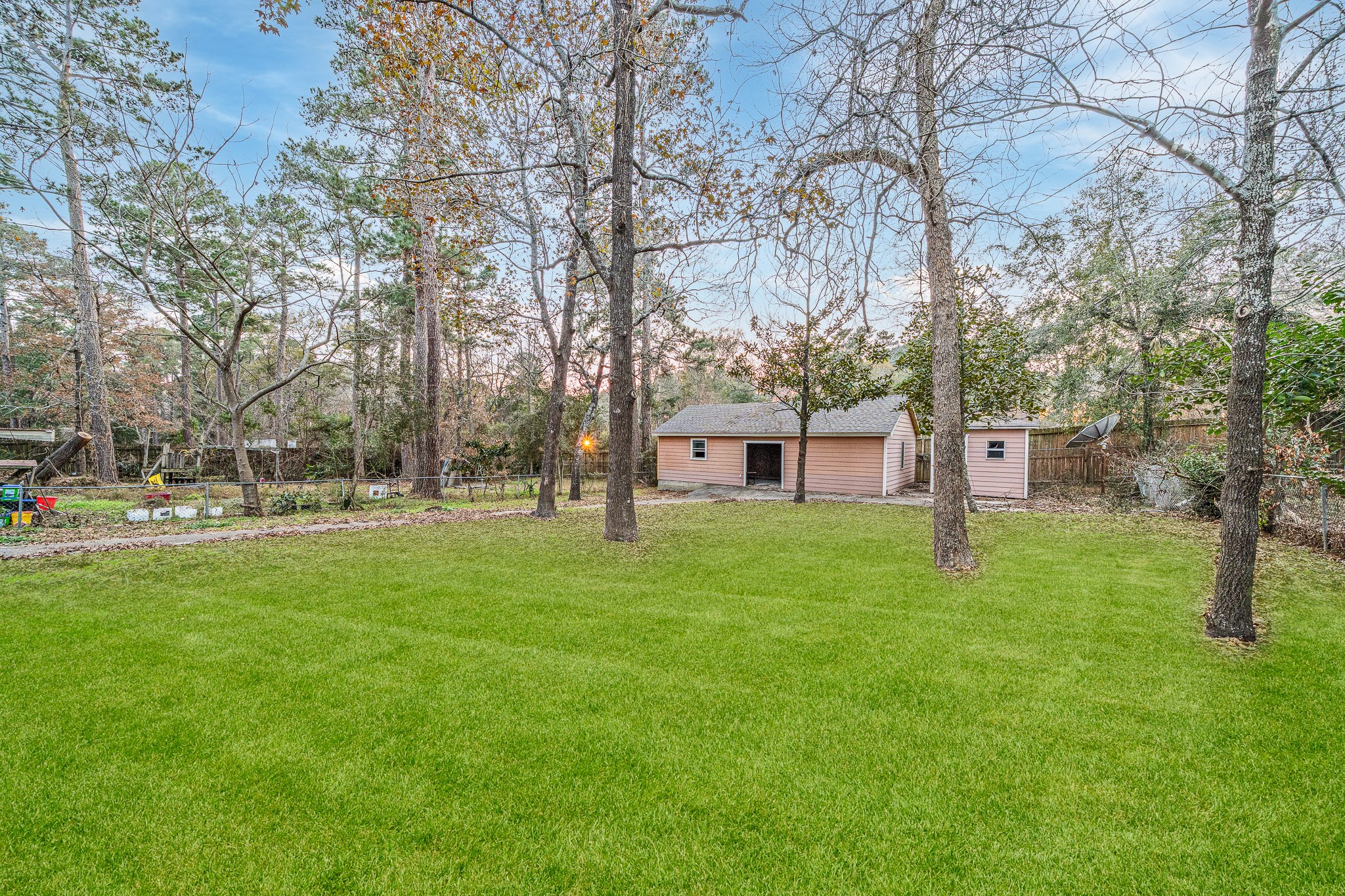 4771 Teas Court Conroe, TX 77304 - Photo 7 of 37 a view of a house with a yard