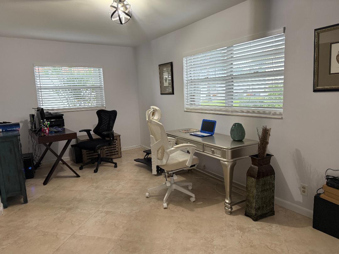 6217 Stanley Lane Delray Beach, FL 33484 - Photo 19 of 26 a view of a workspace with furniture and a window