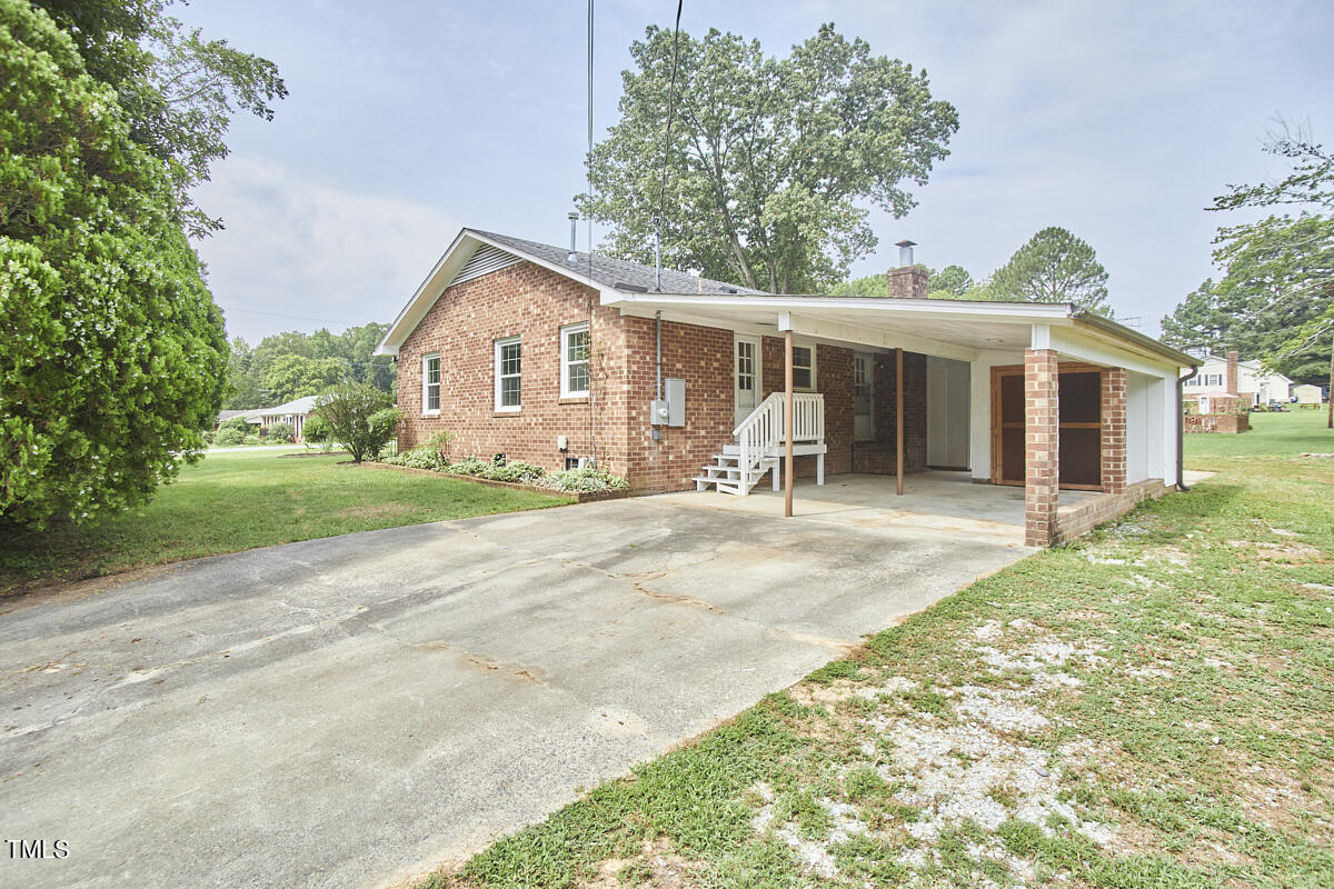 1502 Cassandra Drive Durham, NC 27712 - Photo 47 of 52 a view of a house with a yard
