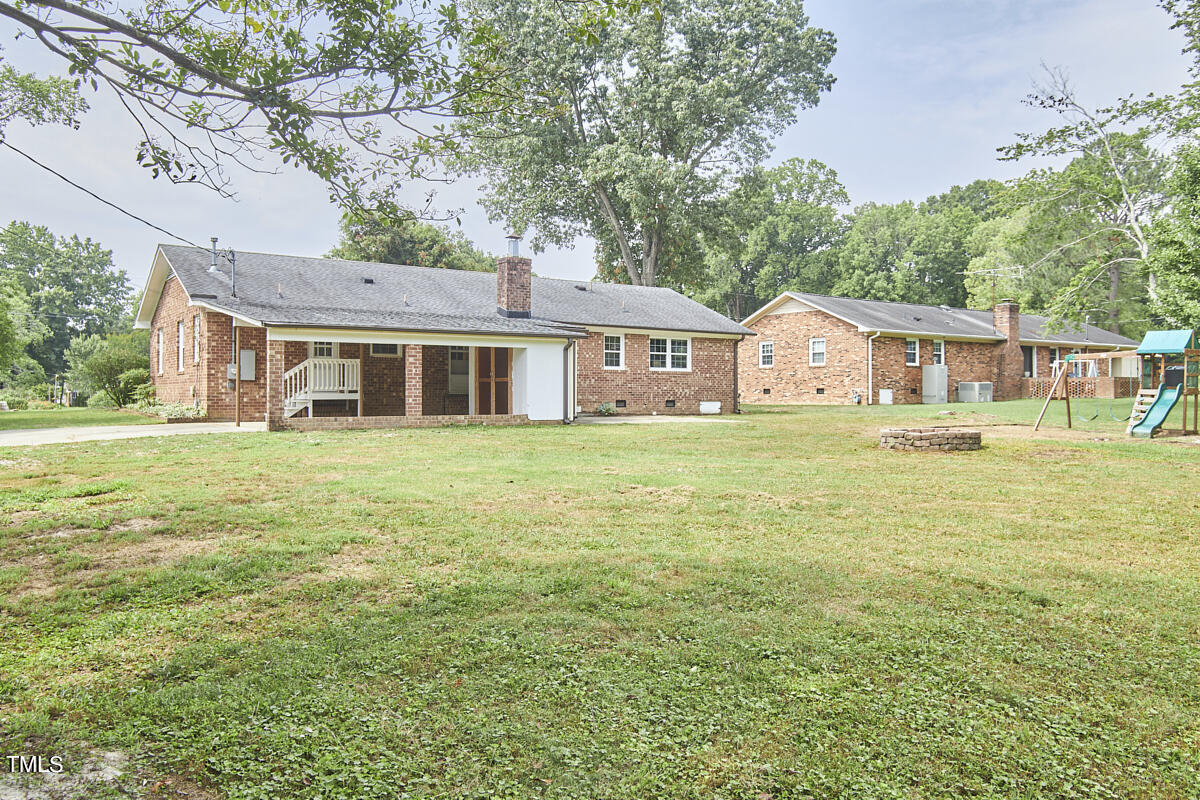 1502 Cassandra Drive Durham, NC 27712 - Photo 48 of 52 a house view with a garden space
