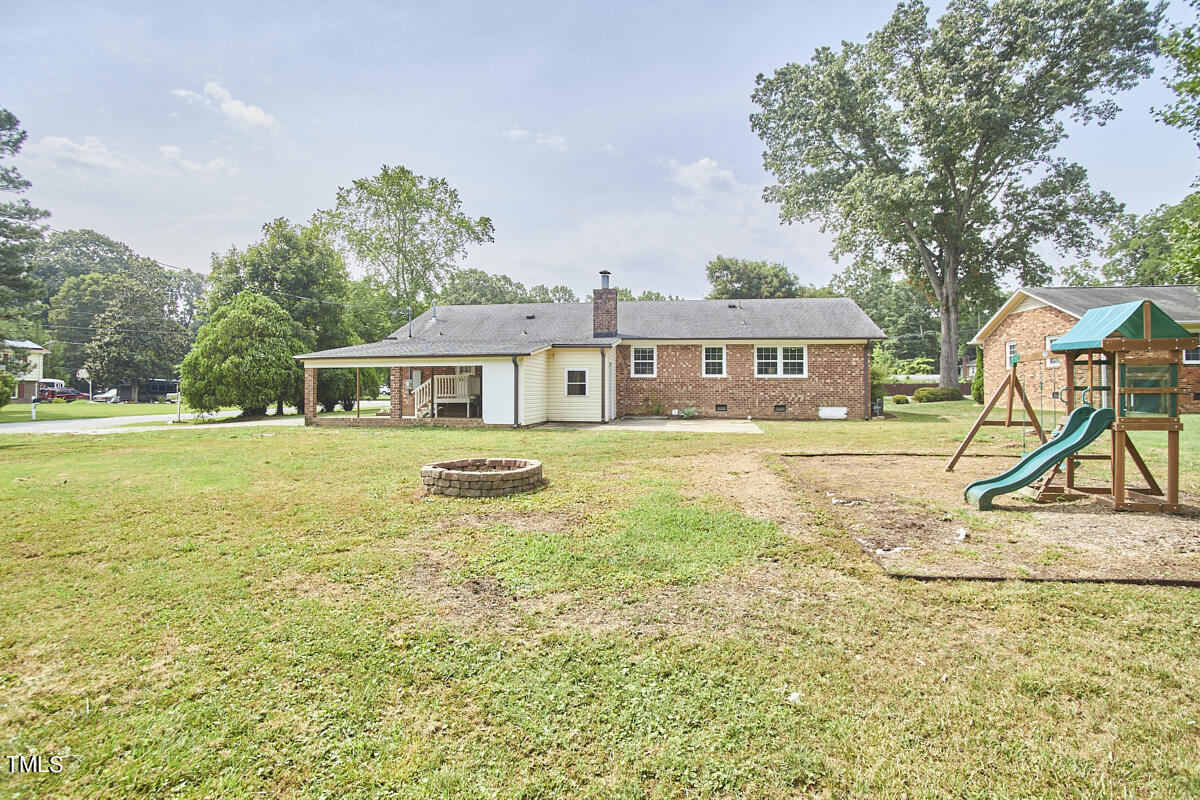 1502 Cassandra Drive Durham, NC 27712 - Photo 50 of 52 a view of house with outdoor space and swimming pool