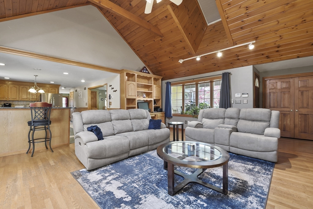 325 Mendall Road Acushnet, MA 02743 - Photo 14 of 42 a living room with furniture and a wooden floor