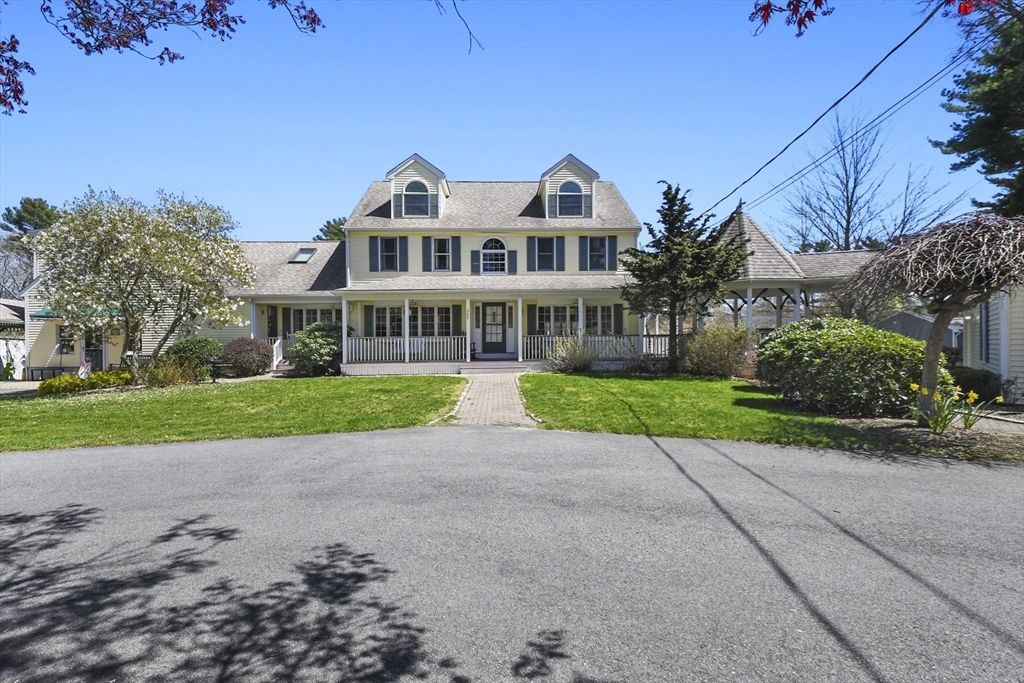 325 Mendall Road Acushnet, MA 02743 - Photo 2 of 42 a front view of house with yard and green space