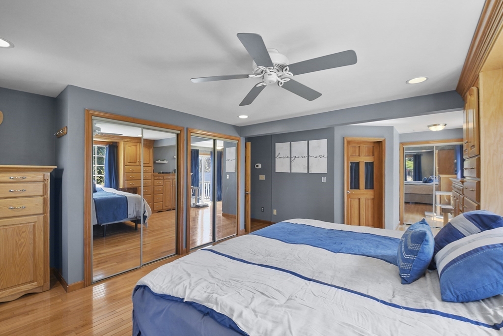 325 Mendall Road Acushnet, MA 02743 - Photo 21 of 42 a bedroom with a large bed and a large window