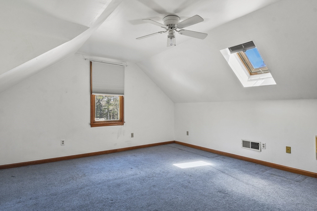 325 Mendall Road Acushnet, MA 02743 - Photo 24 of 42 a view of an empty room with a window