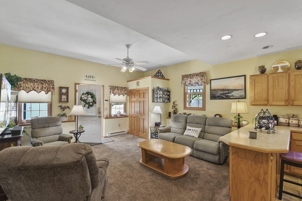 325 Mendall Road Acushnet, MA 02743 - Photo 29 of 42 a living room with furniture and a large window
