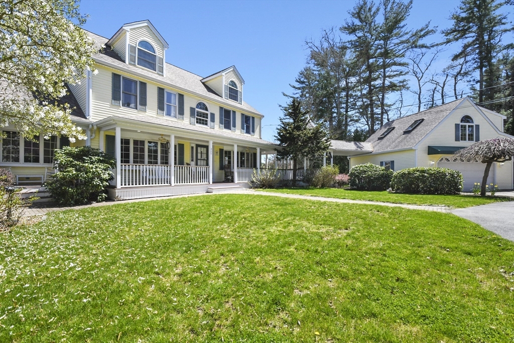 325 Mendall Road Acushnet, MA 02743 - Photo 3 of 42 a front view of a house with a yard and potted plants