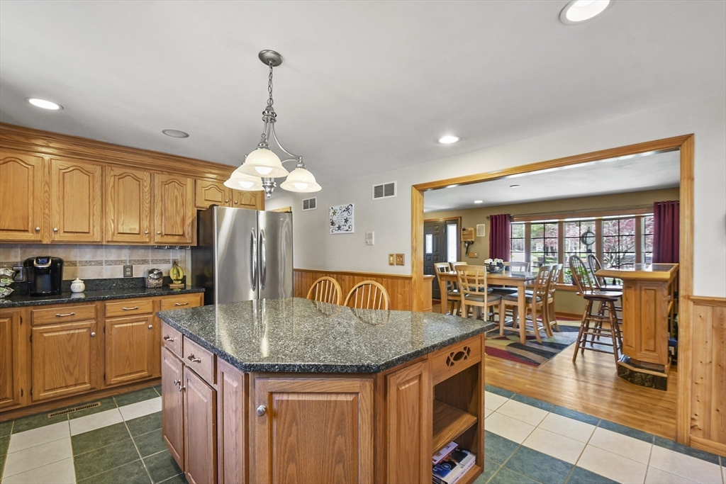325 Mendall Road Acushnet, MA 02743 - Photo 8 of 42 a kitchen with stainless steel appliances granite countertop a stove and refrigerator