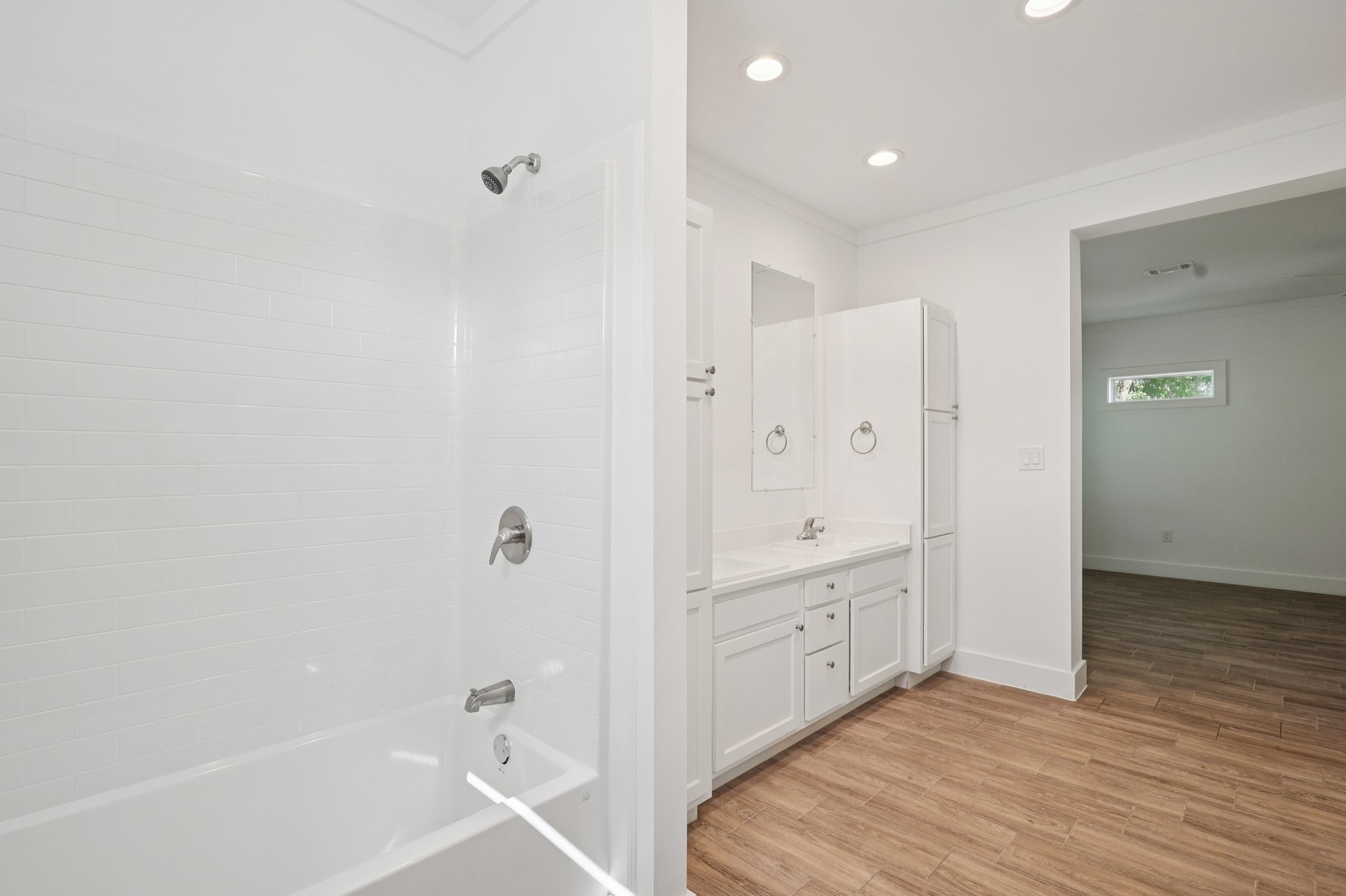 3917 Sayers Street Houston, TX 77026 - Photo 26 of 26 a bathroom with a tub shower vanity and a sink