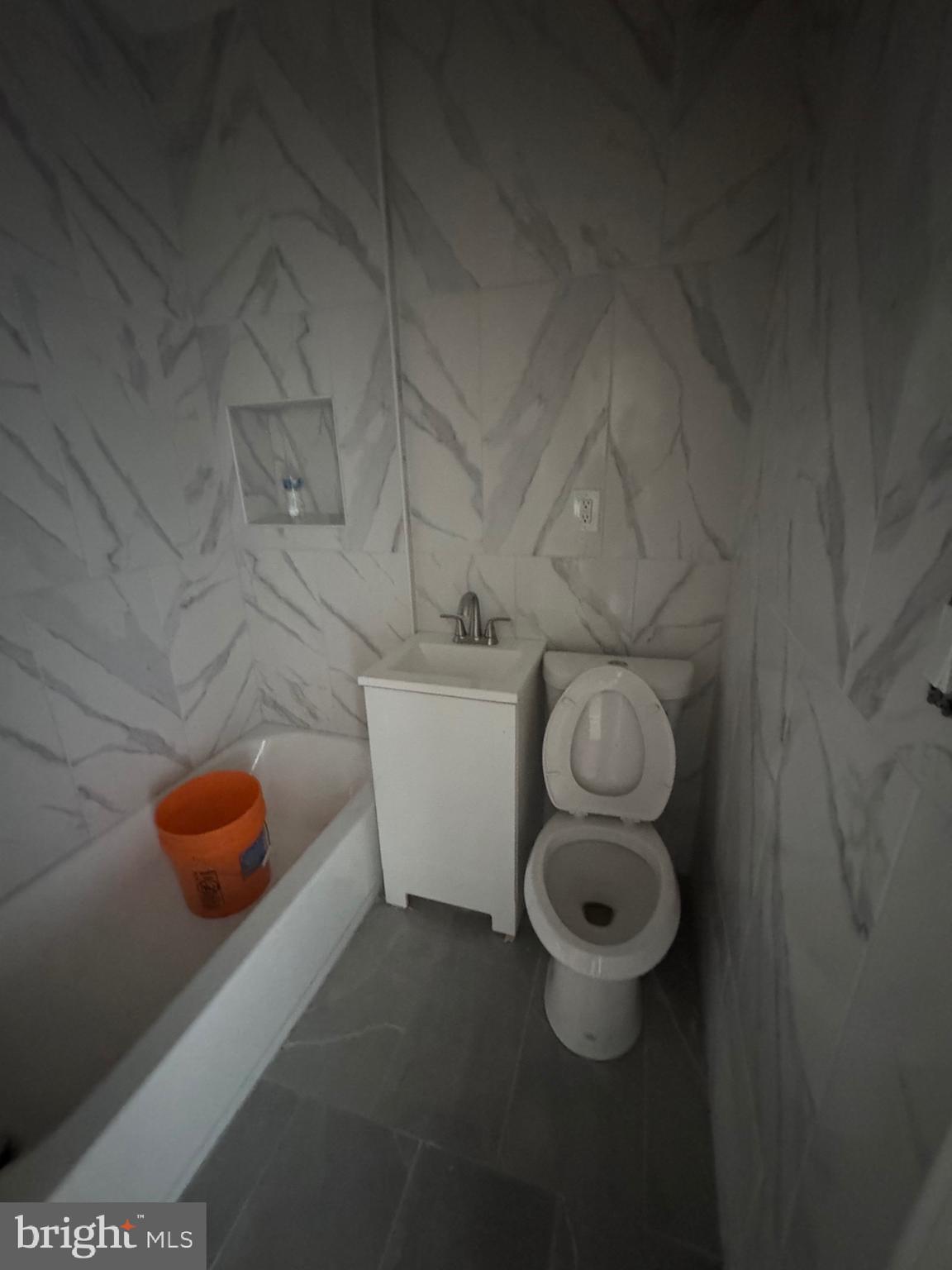 2613 Maisel Street Baltimore, MD 21230 - Photo 8 of 15 a bathroom with a toilet and a sink