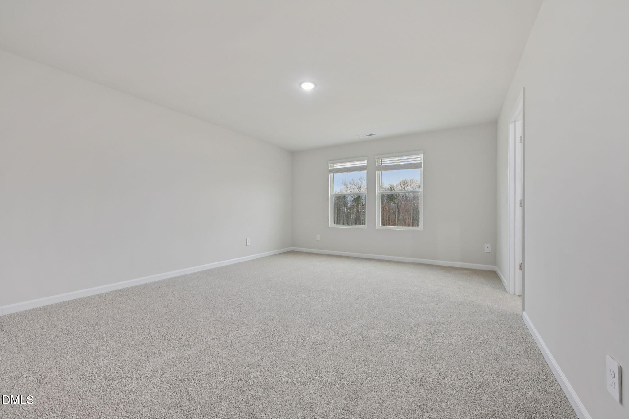 2147 Topsail Road Durham, NC 27703 - Photo 18 of 31 an empty room with a window