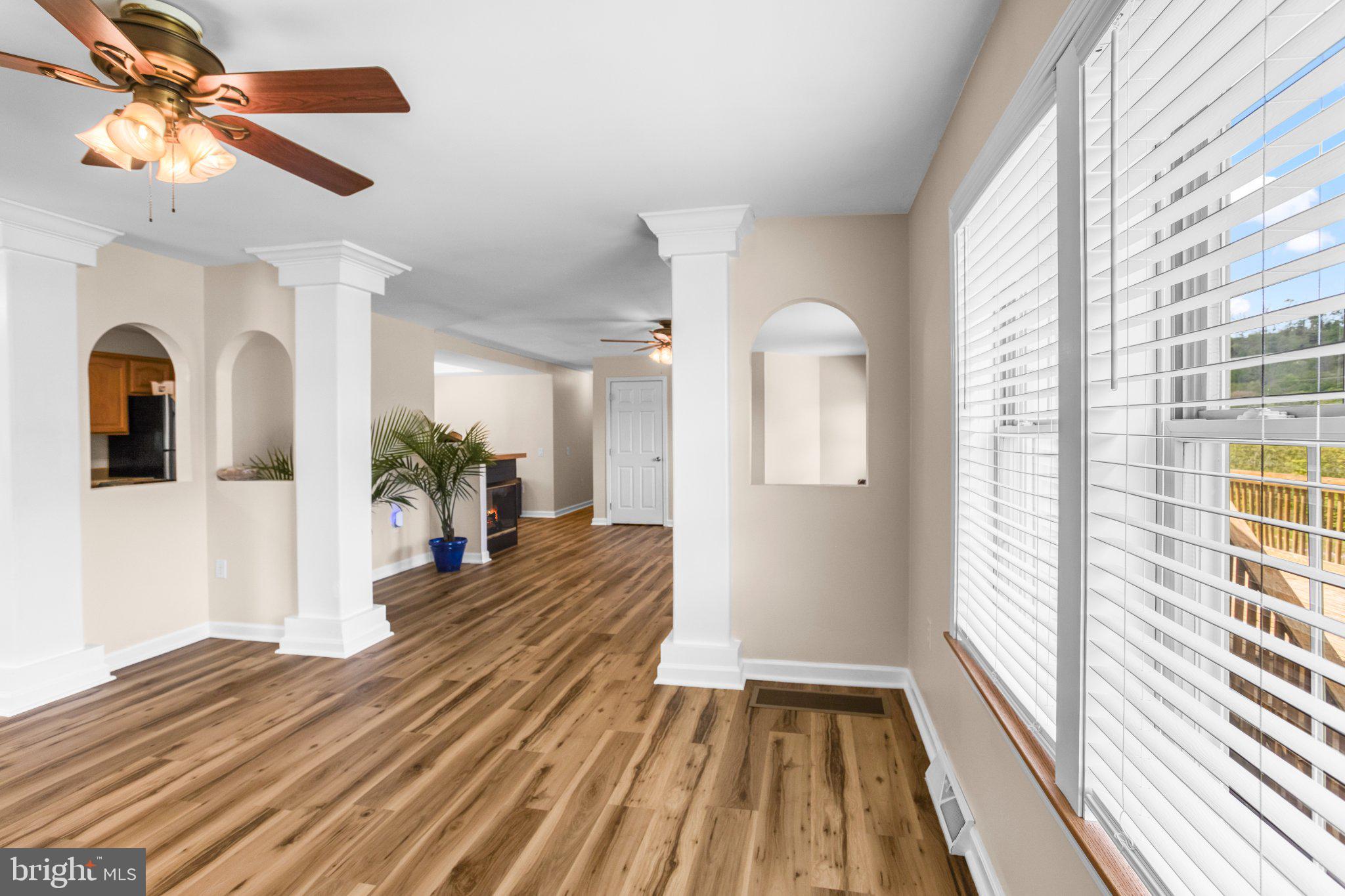 99 Wilt Road Grantsville, MD 21536 - Photo 21 of 56 Spacious living area with elegant arches.