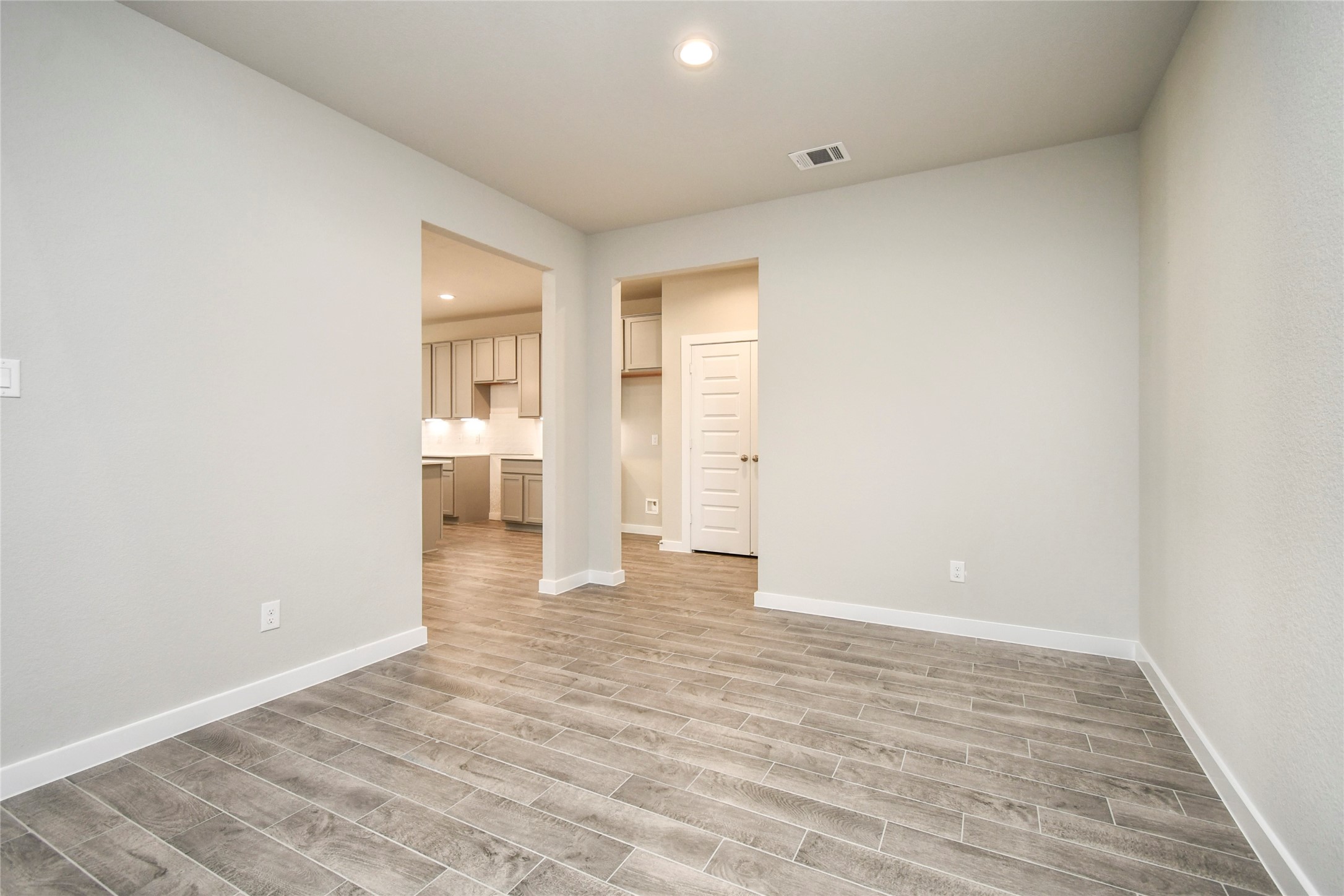 15115 Statice Trail Houston, TX 77044 - Photo 9 of 25 Make memories gathered around the table with your family and friends! This spacious dining
room features elegant flooring, custom paint, and adjacent to family room and kitchen for
open concept feel. Sample photo of completed home with similar floor plan. Actual colors and selections may vary.