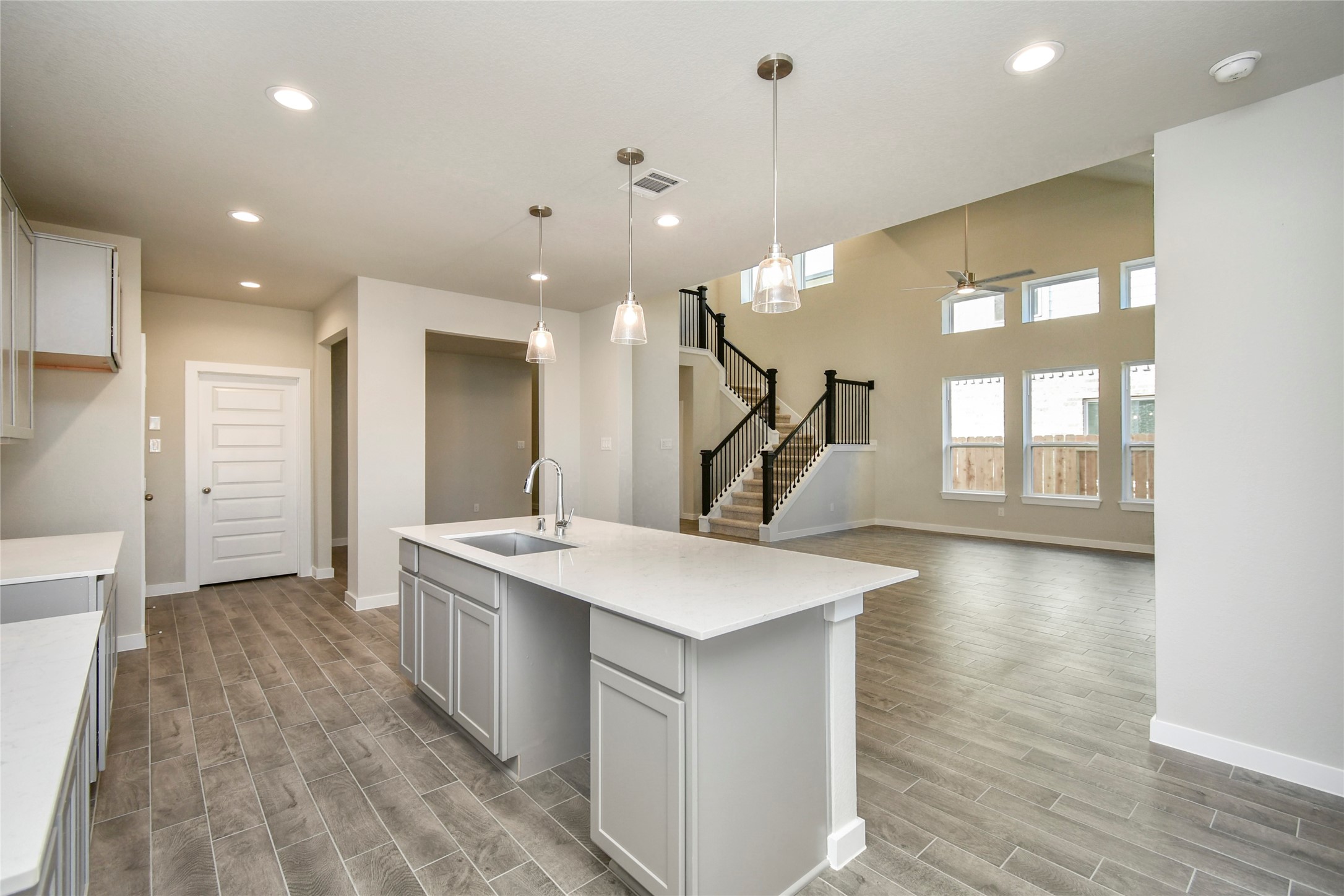 15115 Statice Trail Houston, TX 77044 - Photo 12 of 25 All of this overlooks your expansive family room, creating a perfect space for
culinary delights and family gatherings. Sample photo of completed home with similar floor plan. Actual colors and selections may vary.