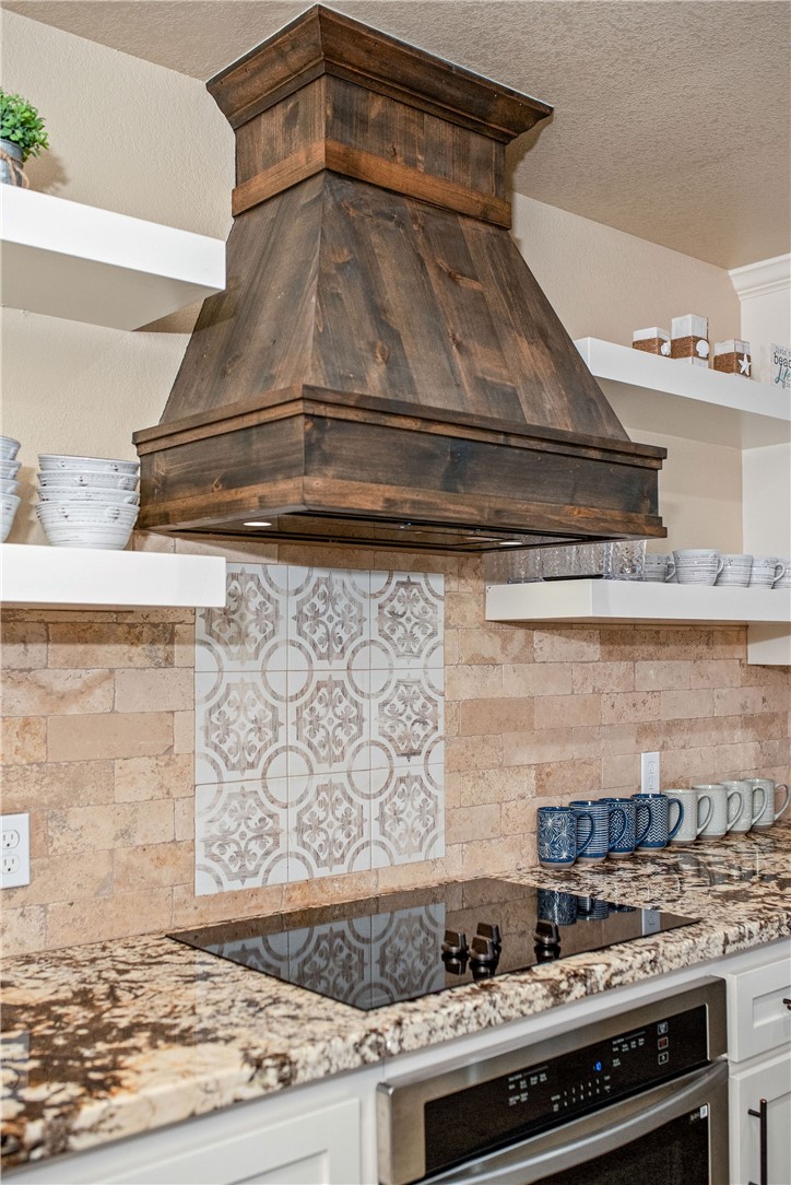 82 Cir Hook Port O'Connor, TX 77982 - Photo 14 of 32 Custom Hood Vent with Designer Backsplash