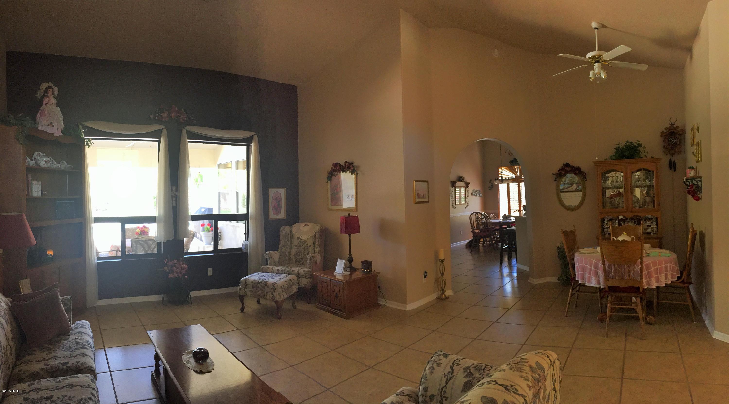 13186 West Granada Road Goodyear, AZ 85395 - Photo 22 of 72 Formal Living and Dining Area