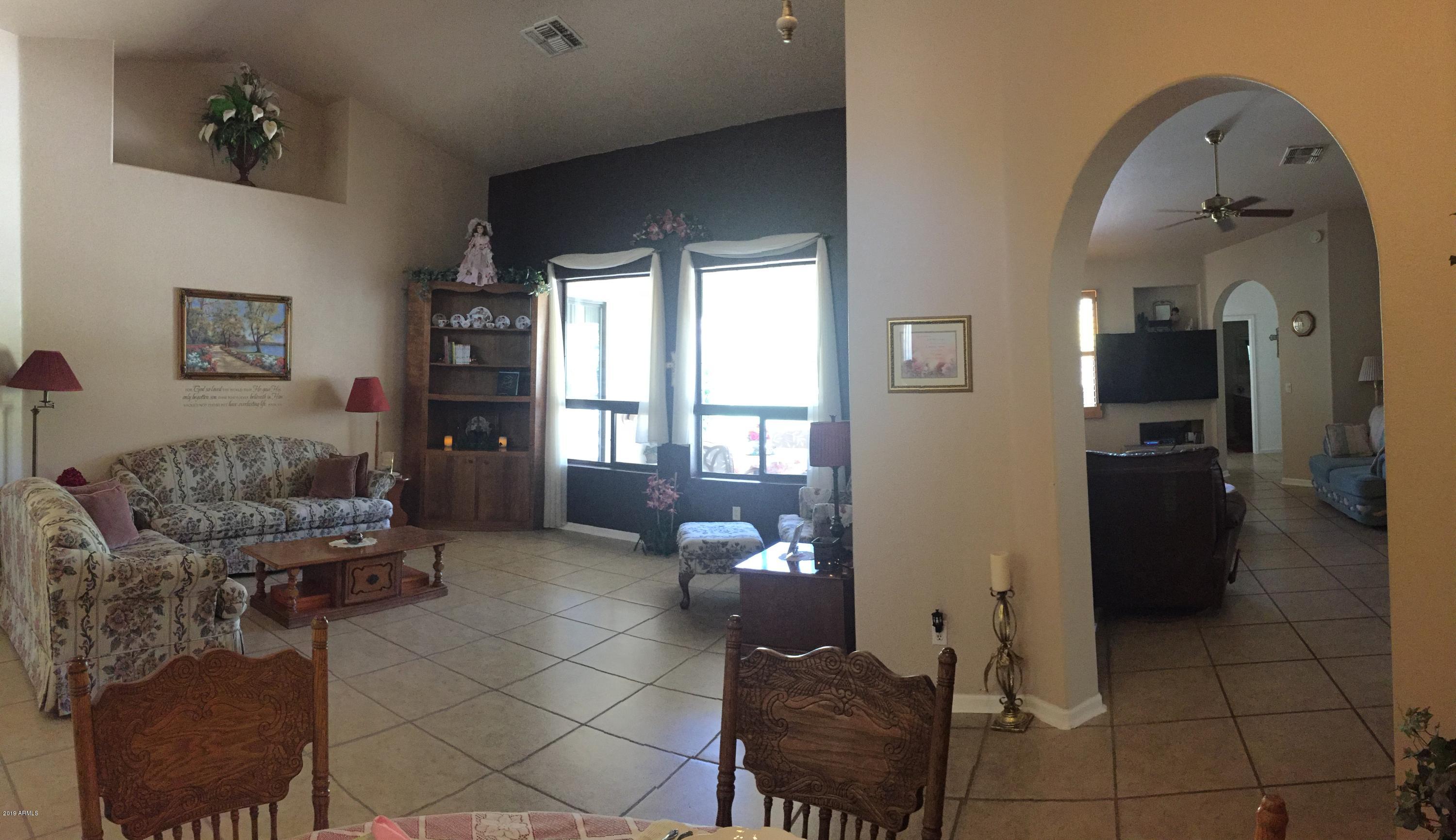 13186 West Granada Road Goodyear, AZ 85395 - Photo 23 of 72 Arch into Family Room