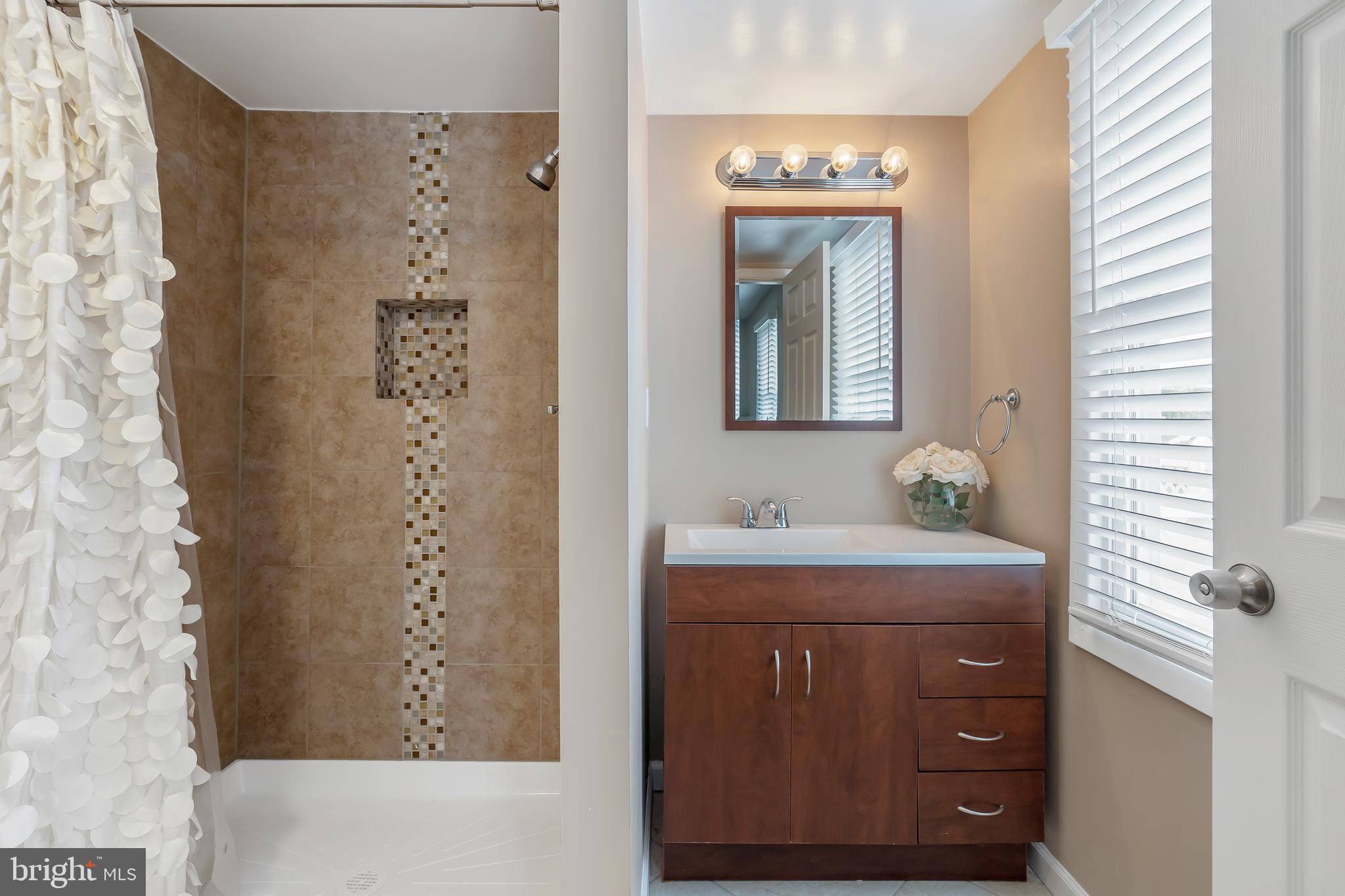 107 Alcock Road Baltimore, MD 21221 - Photo 17 of 29 Custom Tile in the Luxe Master Bath