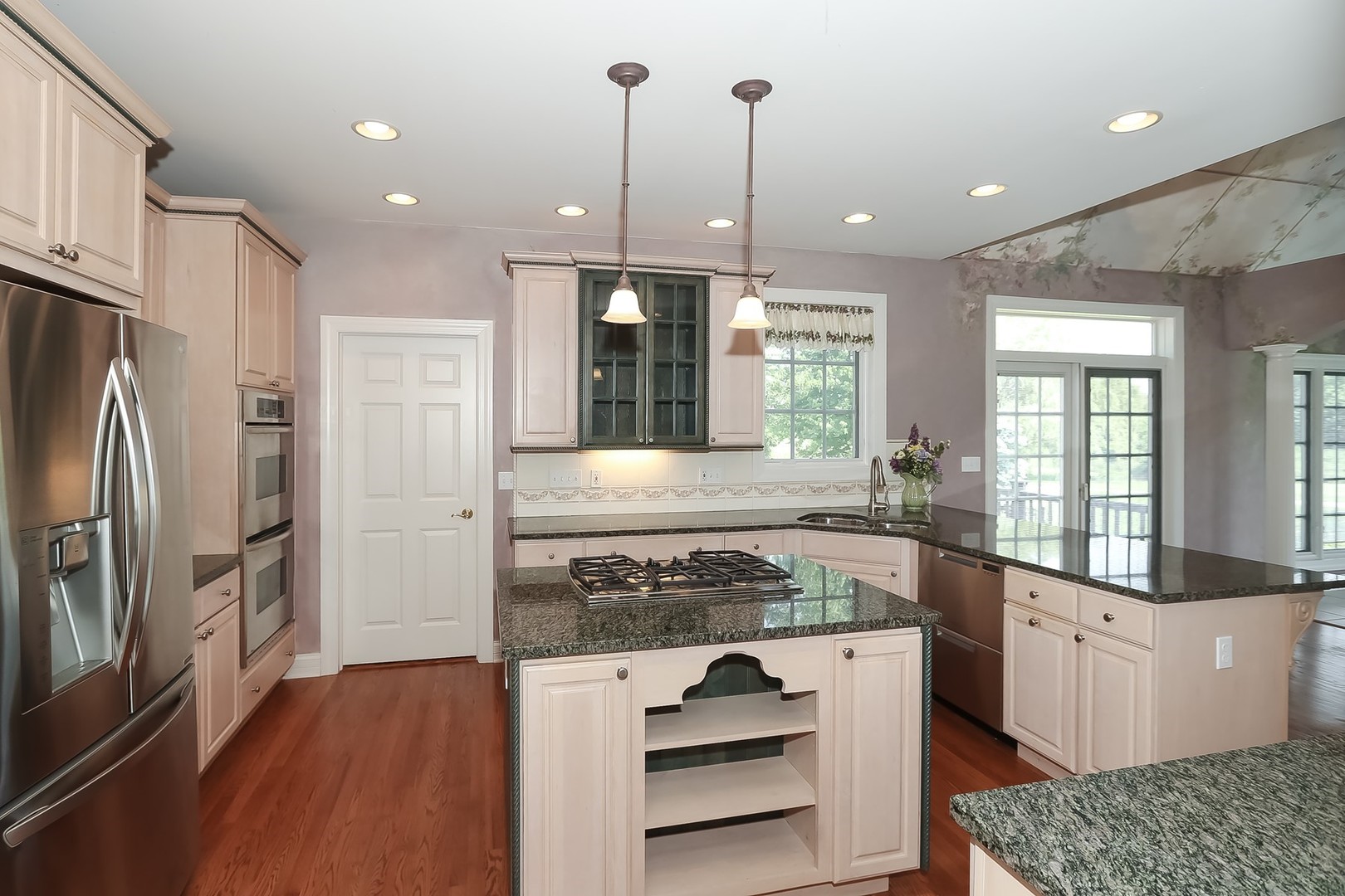 S331 South Mathewson Lane Geneva, IL 60134 - Photo 12 of 40 a kitchen with stainless steel appliances granite countertop a sink stove and refrigerator