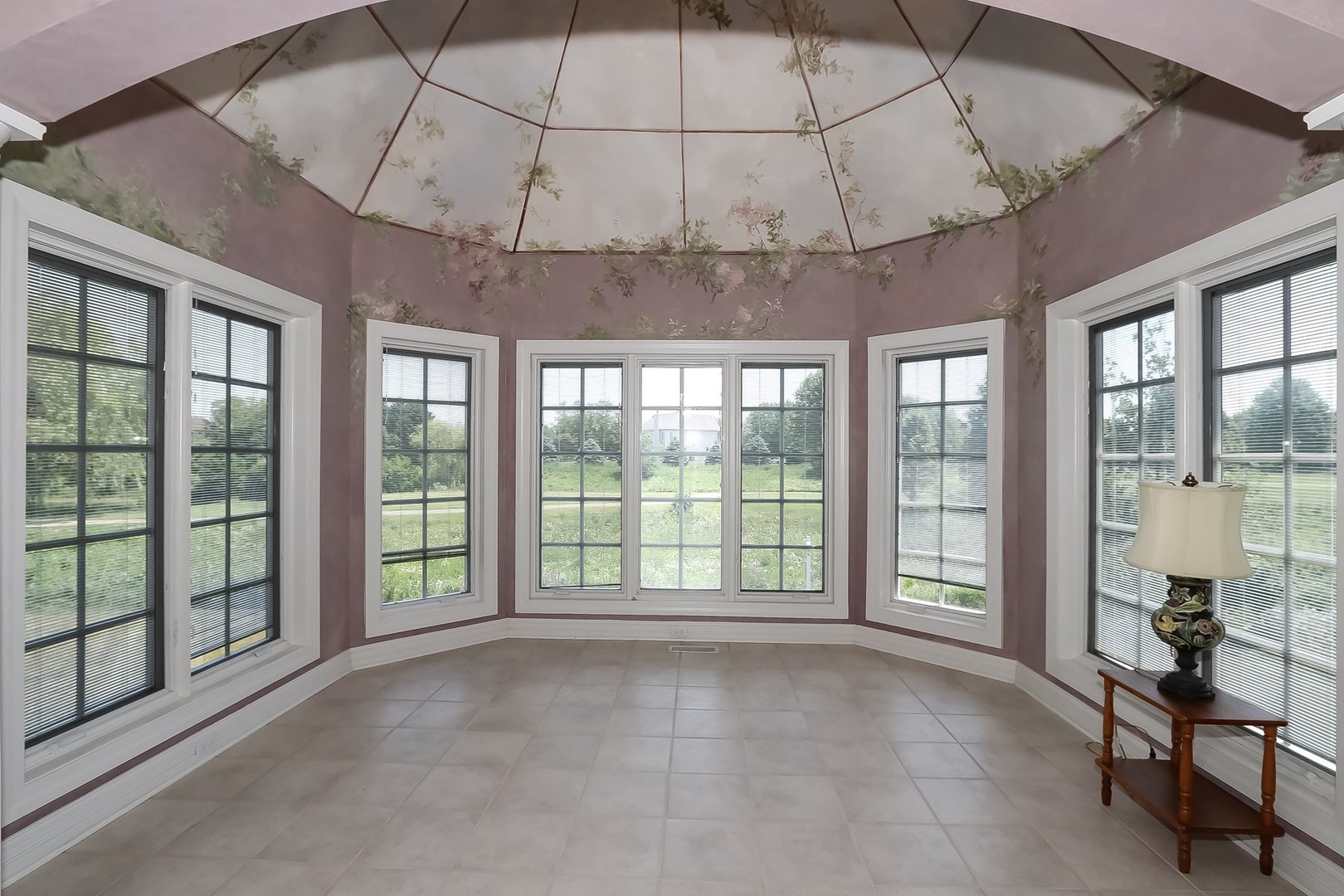 S331 South Mathewson Lane Geneva, IL 60134 - Photo 16 of 40 a view of a livingroom with furniture and floor to ceiling window