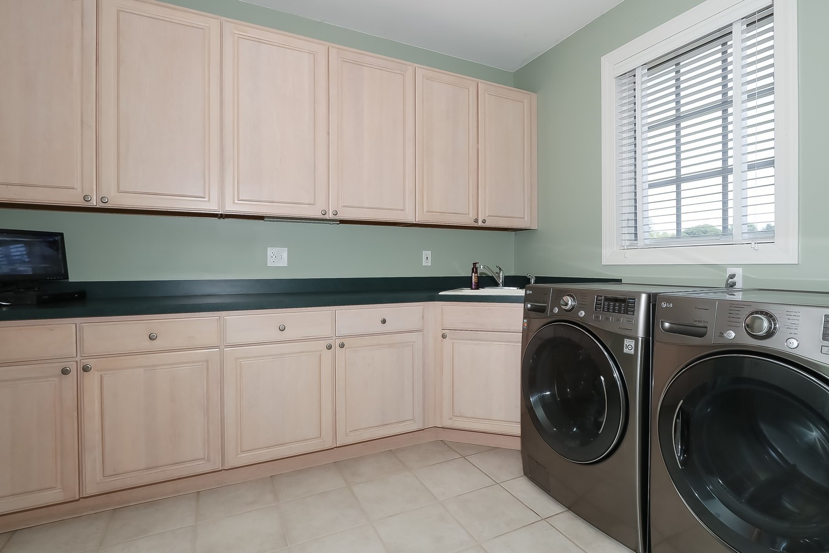 S331 South Mathewson Lane Geneva, IL 60134 - Photo 18 of 40 a view of a kitchen with washer and dryer