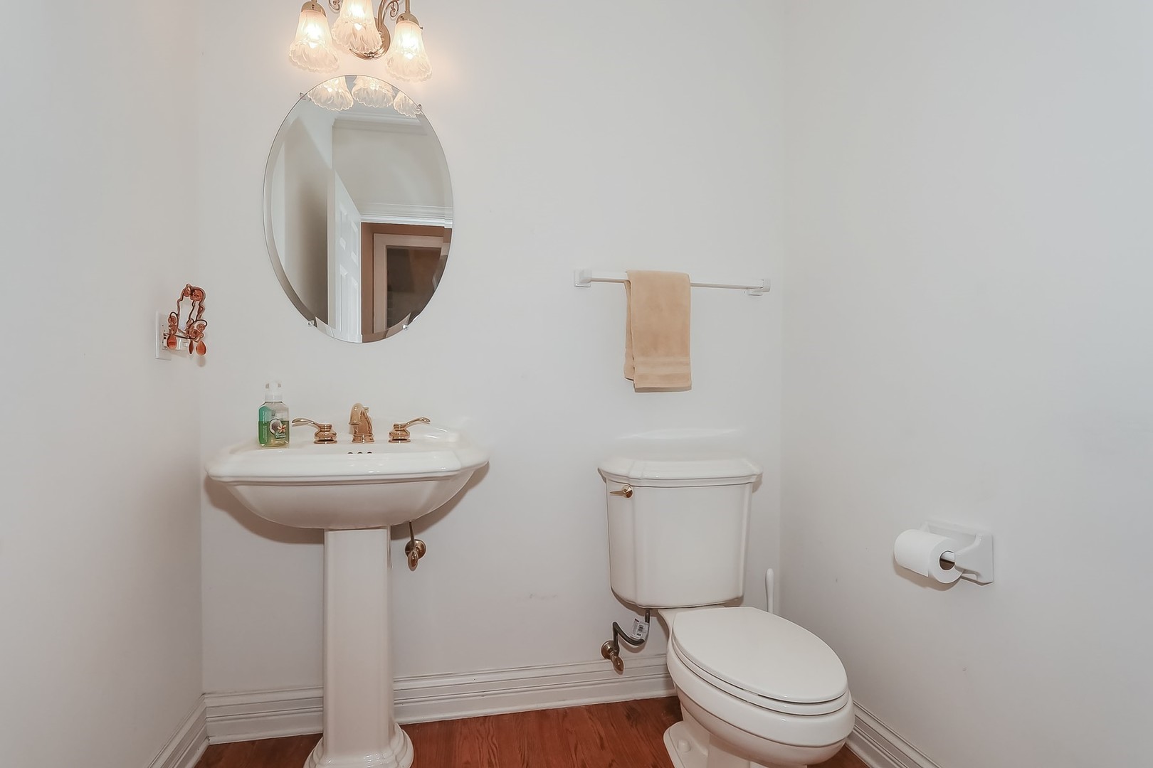 S331 South Mathewson Lane Geneva, IL 60134 - Photo 19 of 40 a bathroom with a toilet sink and mirror
