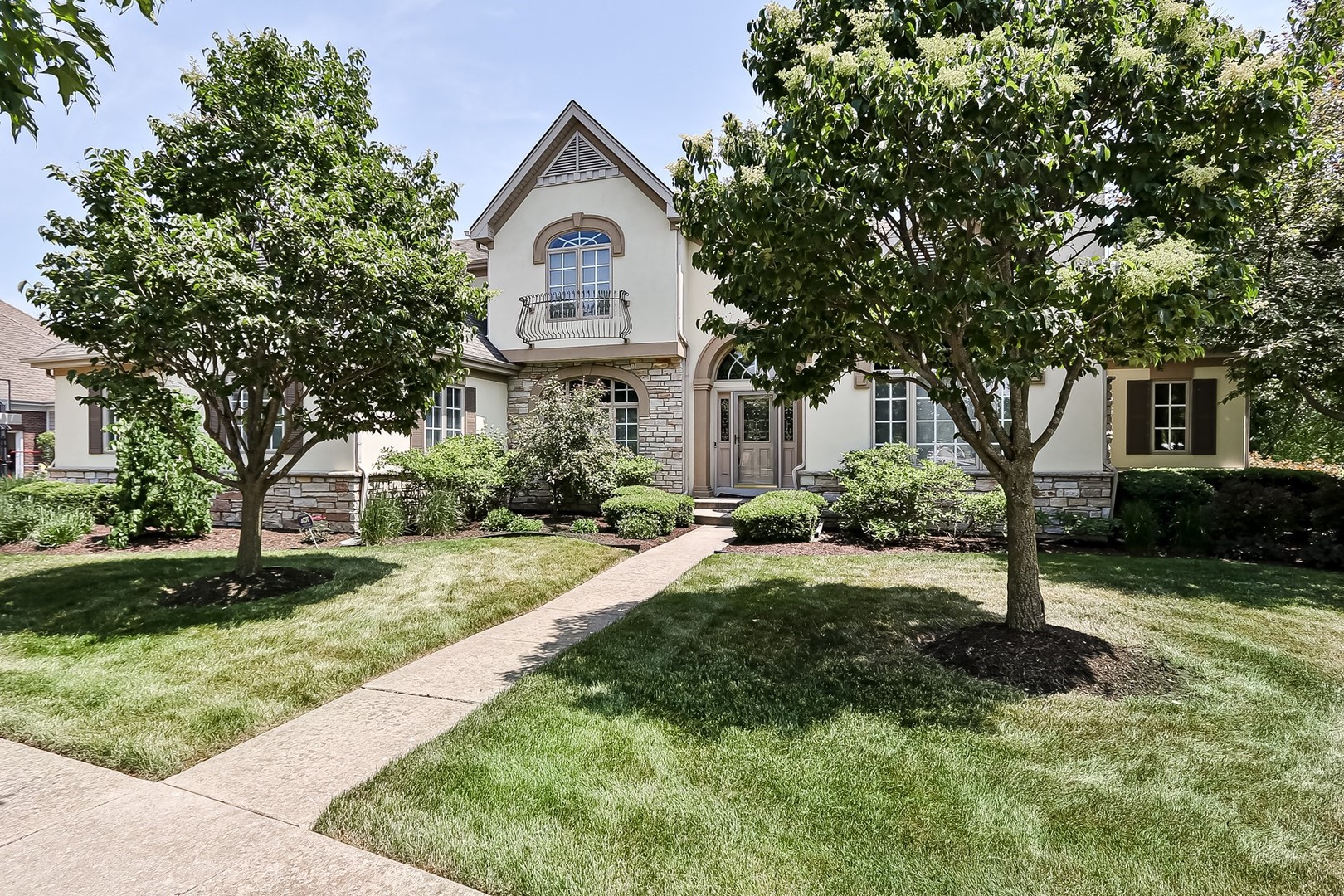 S331 South Mathewson Lane Geneva, IL 60134 - Photo 2 of 40 a front view of a house with yard and green space