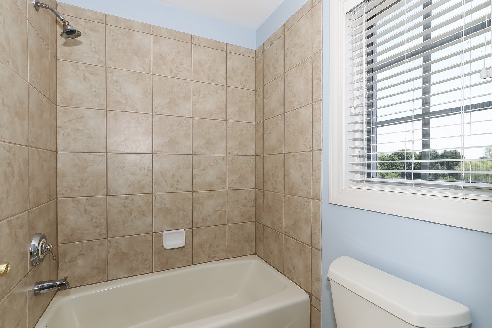 S331 South Mathewson Lane Geneva, IL 60134 - Photo 26 of 40 a bathroom with a bathtub and window