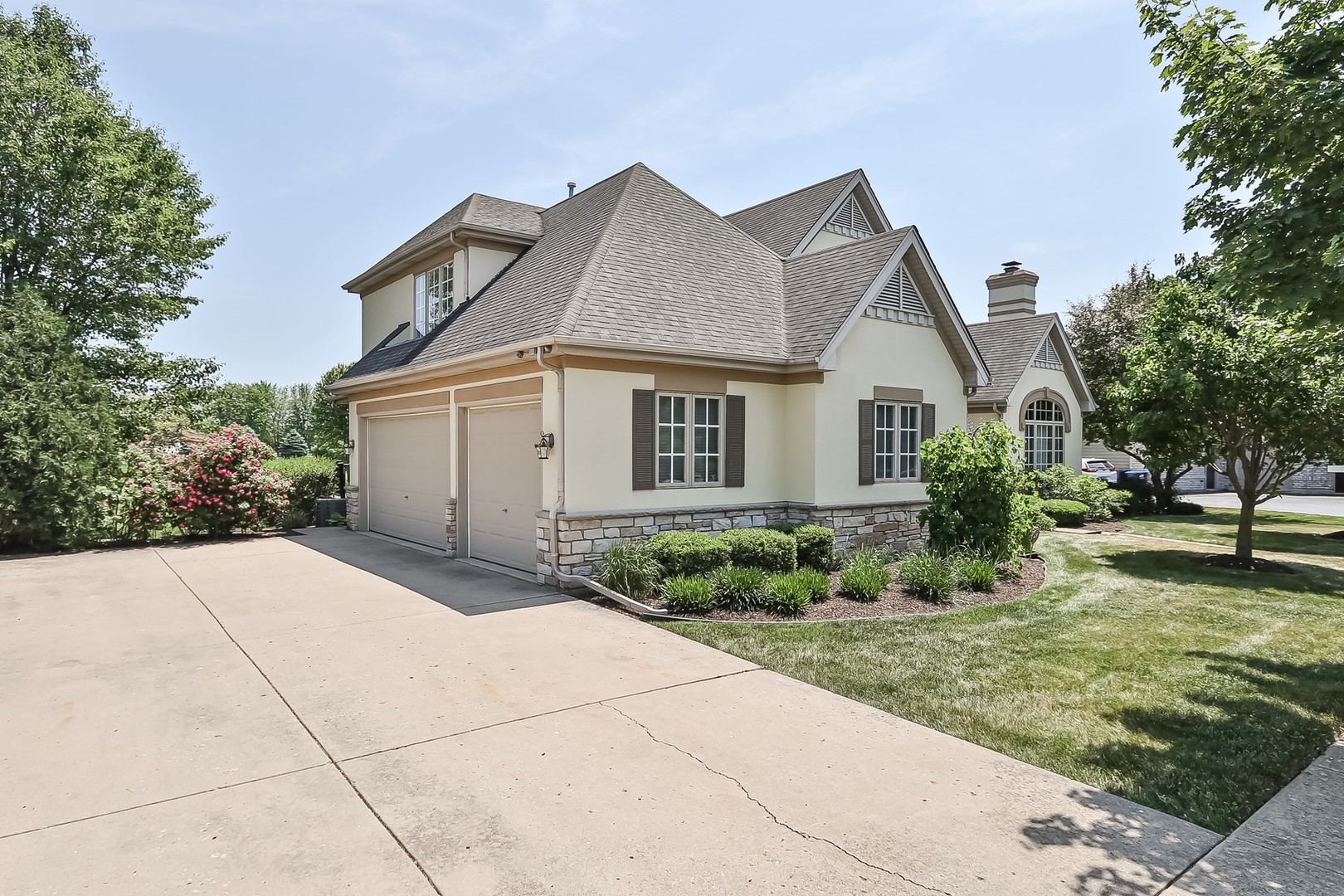 S331 South Mathewson Lane Geneva, IL 60134 - Photo 39 of 40 a front view of a house with garden