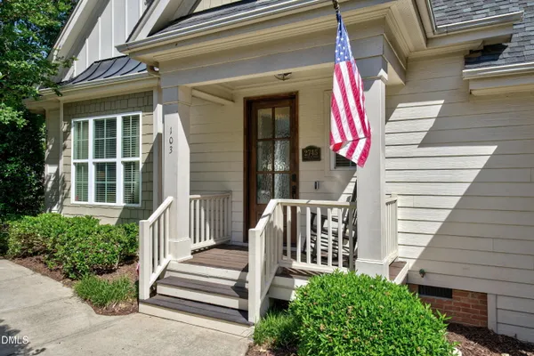 a front view of a house with a porch