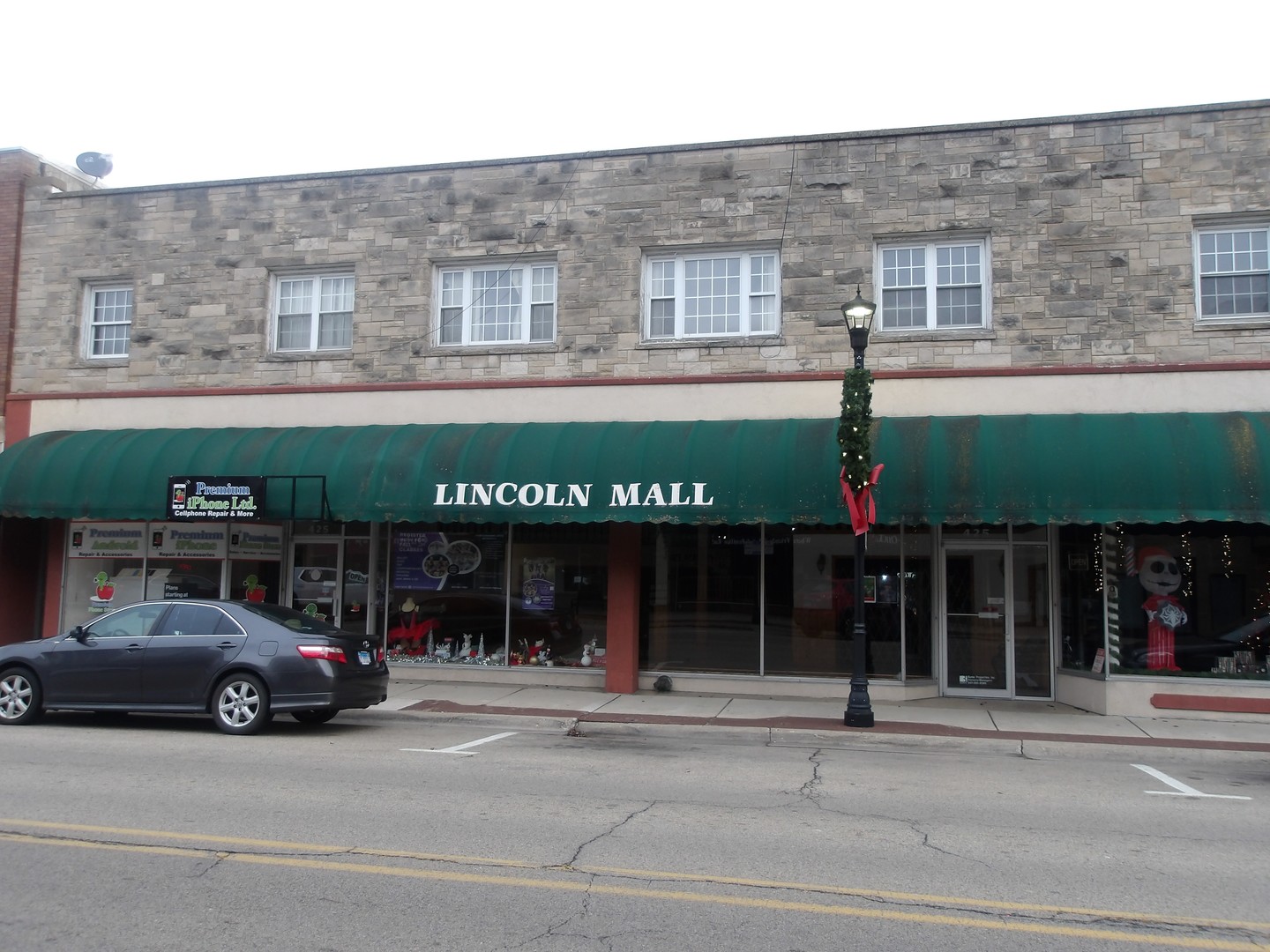 425 Lincoln Highway Rochelle, IL 61068 - Photo 1 of 1 a view of a building with a window and a car parked in front of it