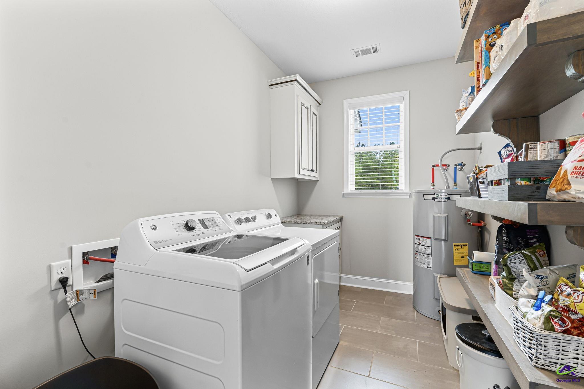 180 Woodland Trail Road Cochran, GA 31014 - Photo 20 of 25 a utility room with dryer and washer