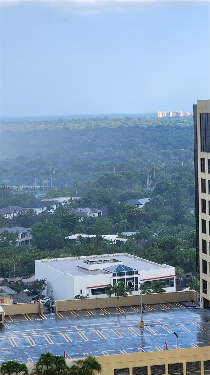 9066 Southwest 73rd Court, Unit 2003 Miami, FL 33156 - Photo 5 of 5 a view of a city with tall buildings