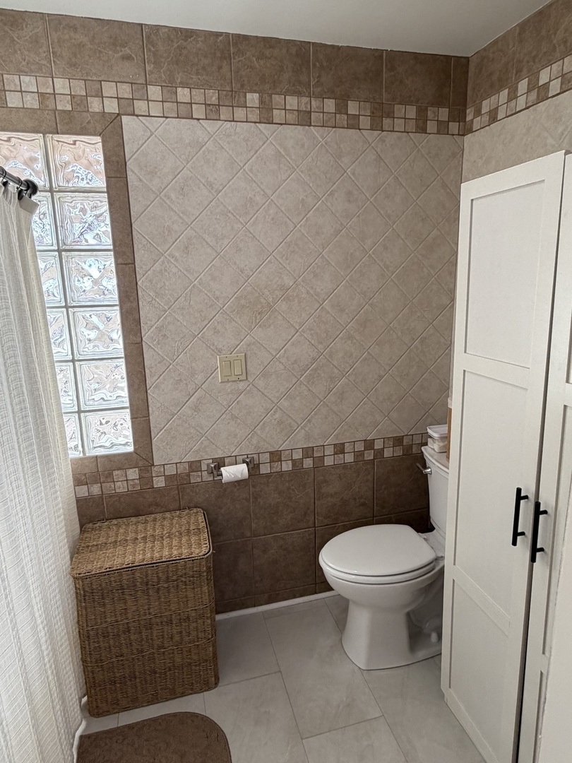 17245 County Line Road Plainfield, IL 60586 - Photo 11 of 45 a bathroom with a toilet and a shower