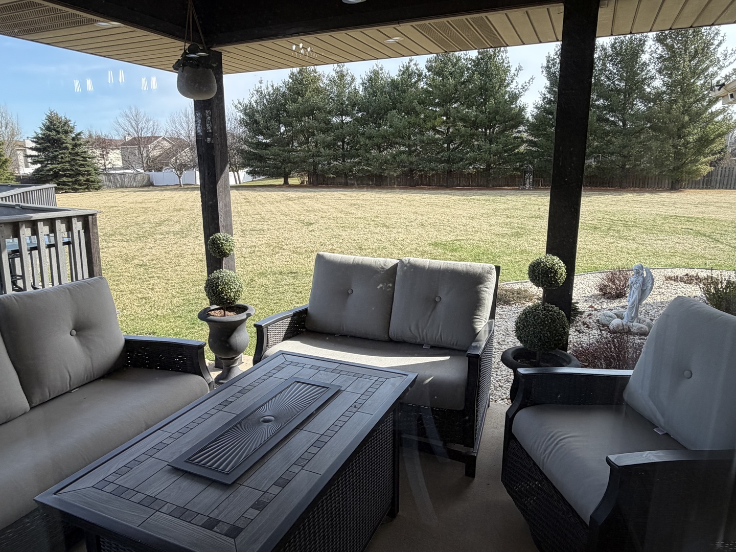 17245 County Line Road Plainfield, IL 60586 - Photo 35 of 45 a balcony with wooden floor and outdoor seating