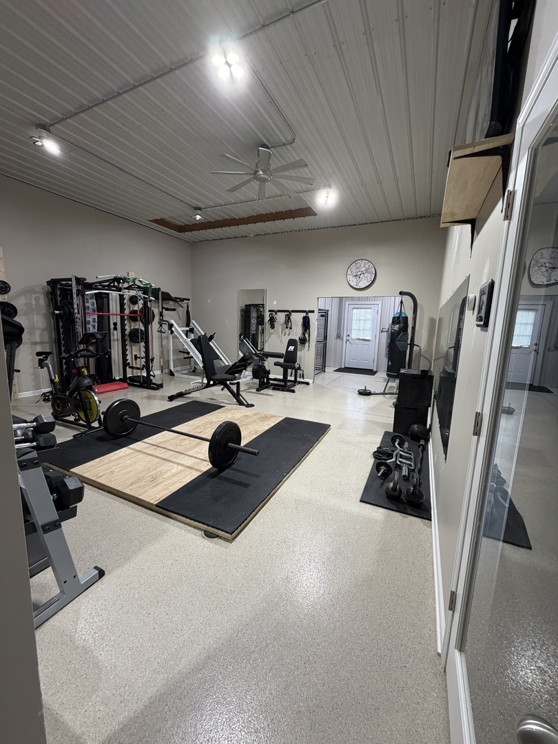 17245 County Line Road Plainfield, IL 60586 - Photo 37 of 45 a view of a room with gym equipment