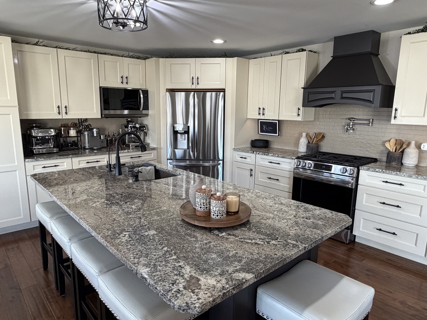 17245 County Line Road Plainfield, IL 60586 - Photo 4 of 45 a kitchen with stainless steel appliances granite countertop a sink stove and refrigerator