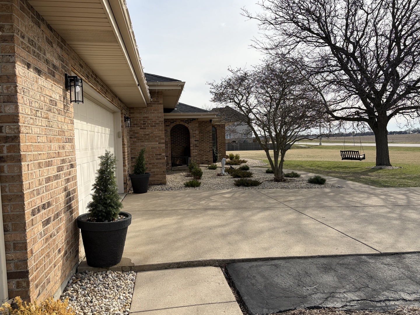 17245 County Line Road Plainfield, IL 60586 - Photo 43 of 45 a view of a house with backyard and sitting area