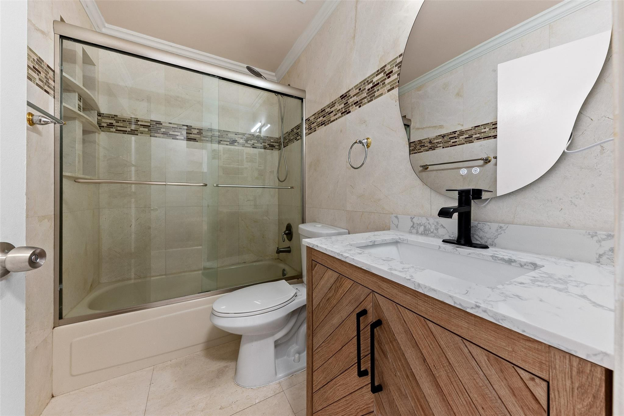9918 Moss Pond Drive Boca Raton, FL 33496 - Photo 21 of 31 a bathroom with a sink a toilet and shower