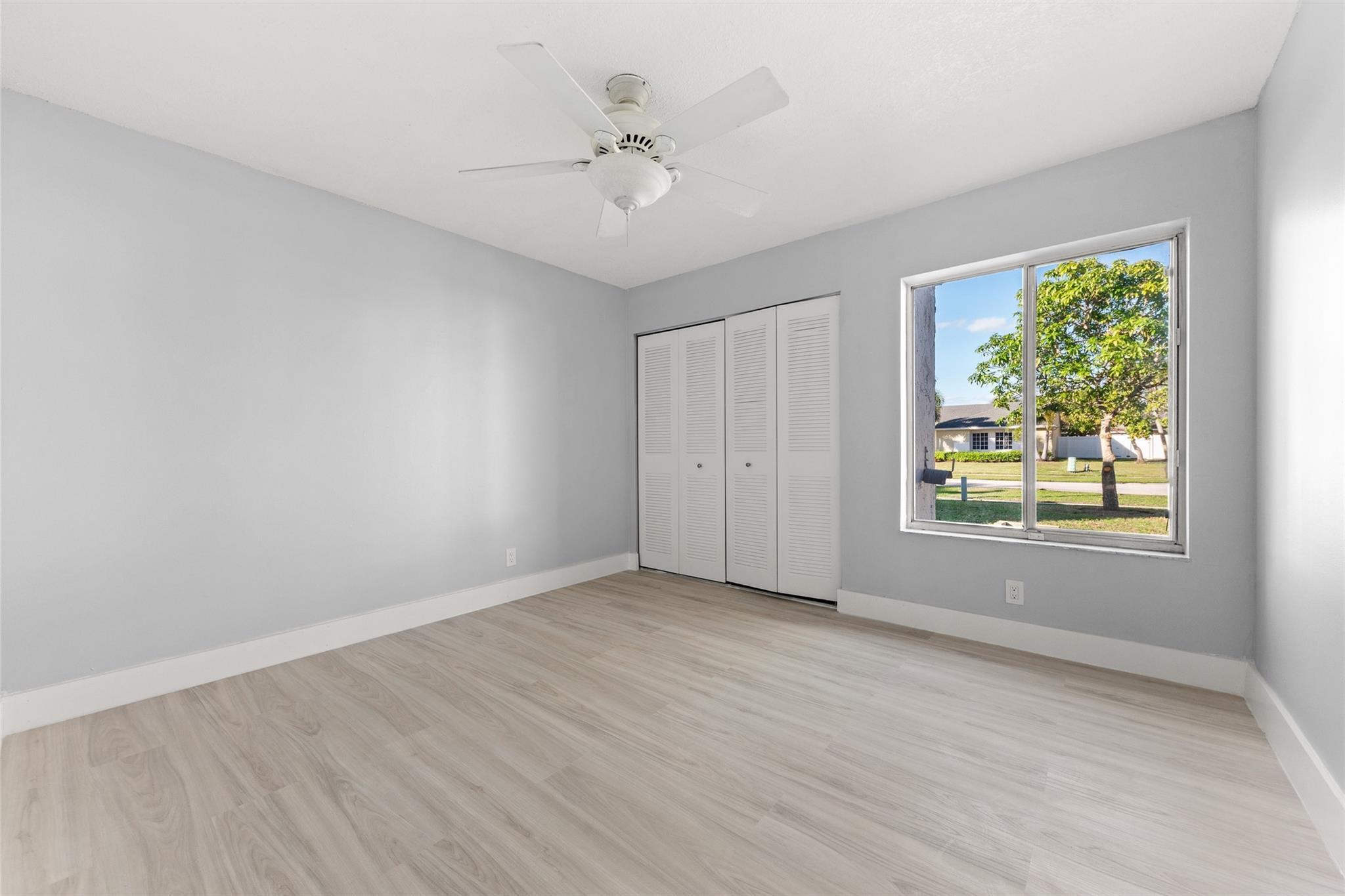 9918 Moss Pond Drive Boca Raton, FL 33496 - Photo 22 of 31 a view of an empty room with a window